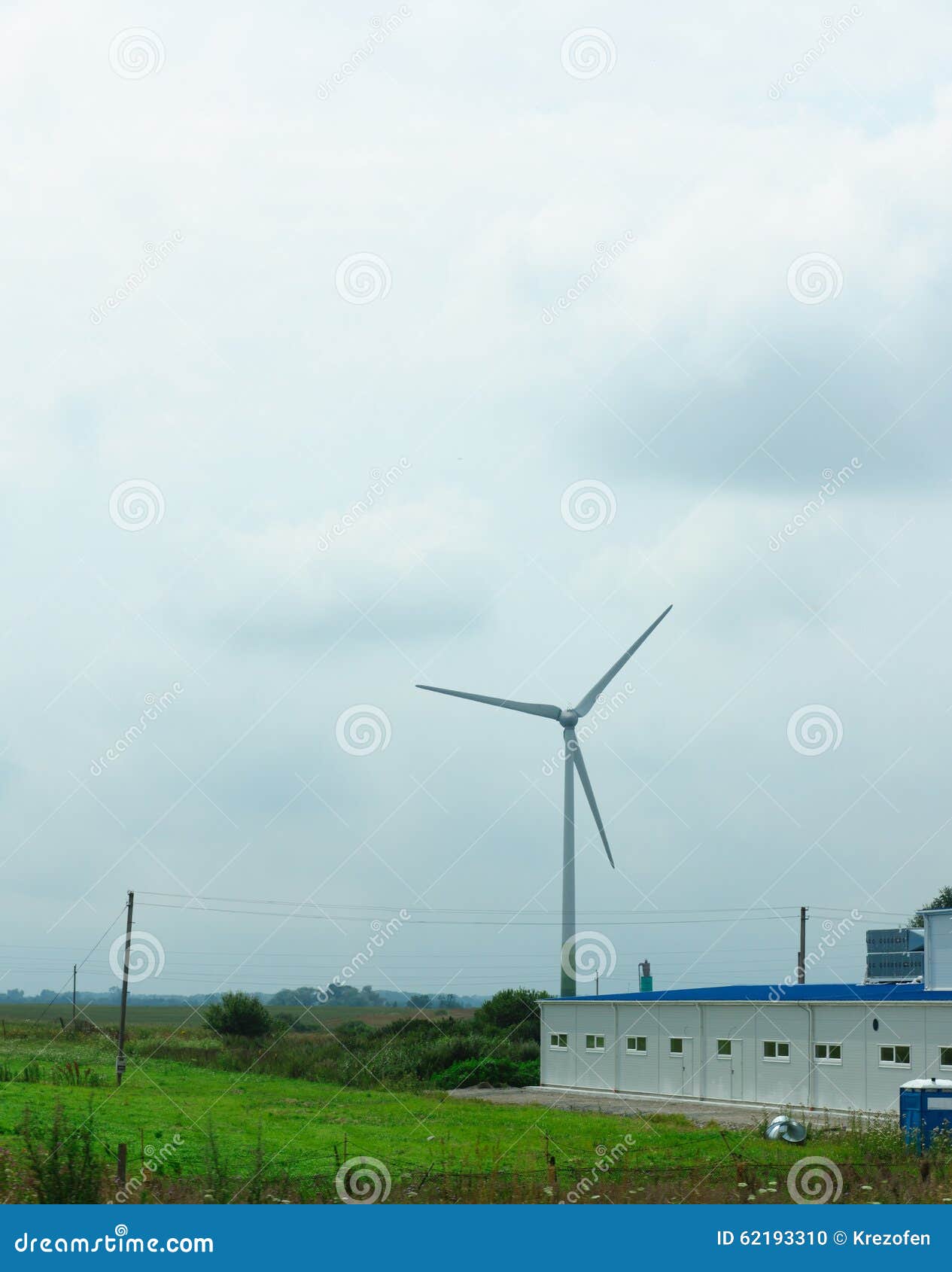 Winddriven Generator in the Middle of a Field Stock Photo Image of