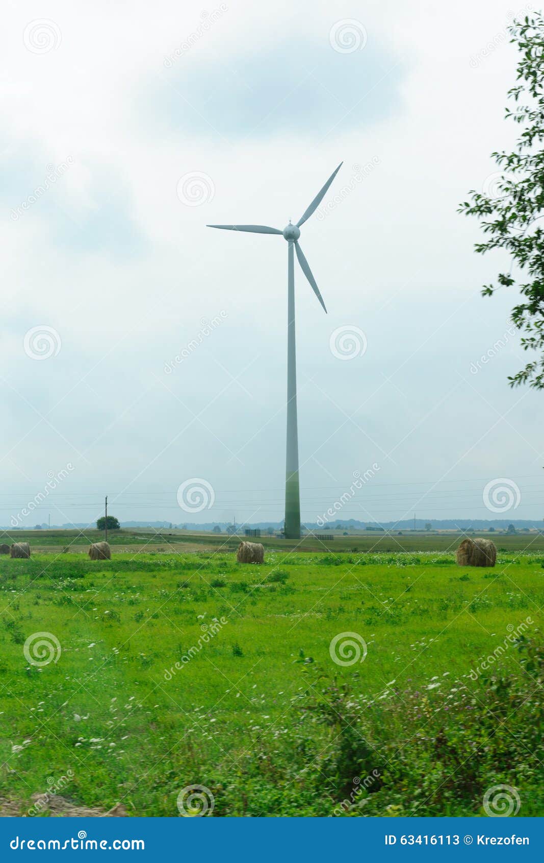 Winddriven Generator in the Middle of a Field Stock Image Image of