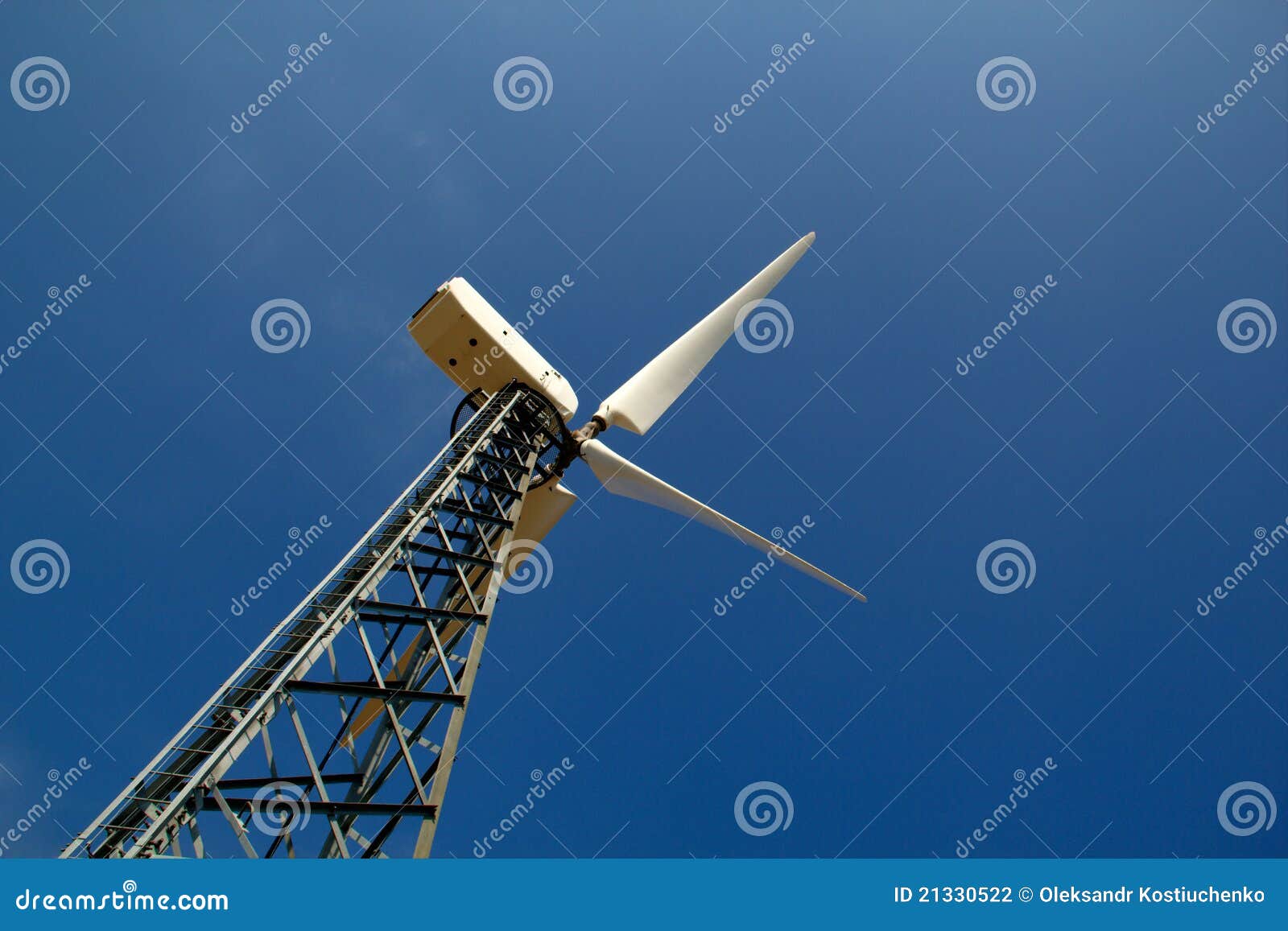 the wind generator against the blue sky