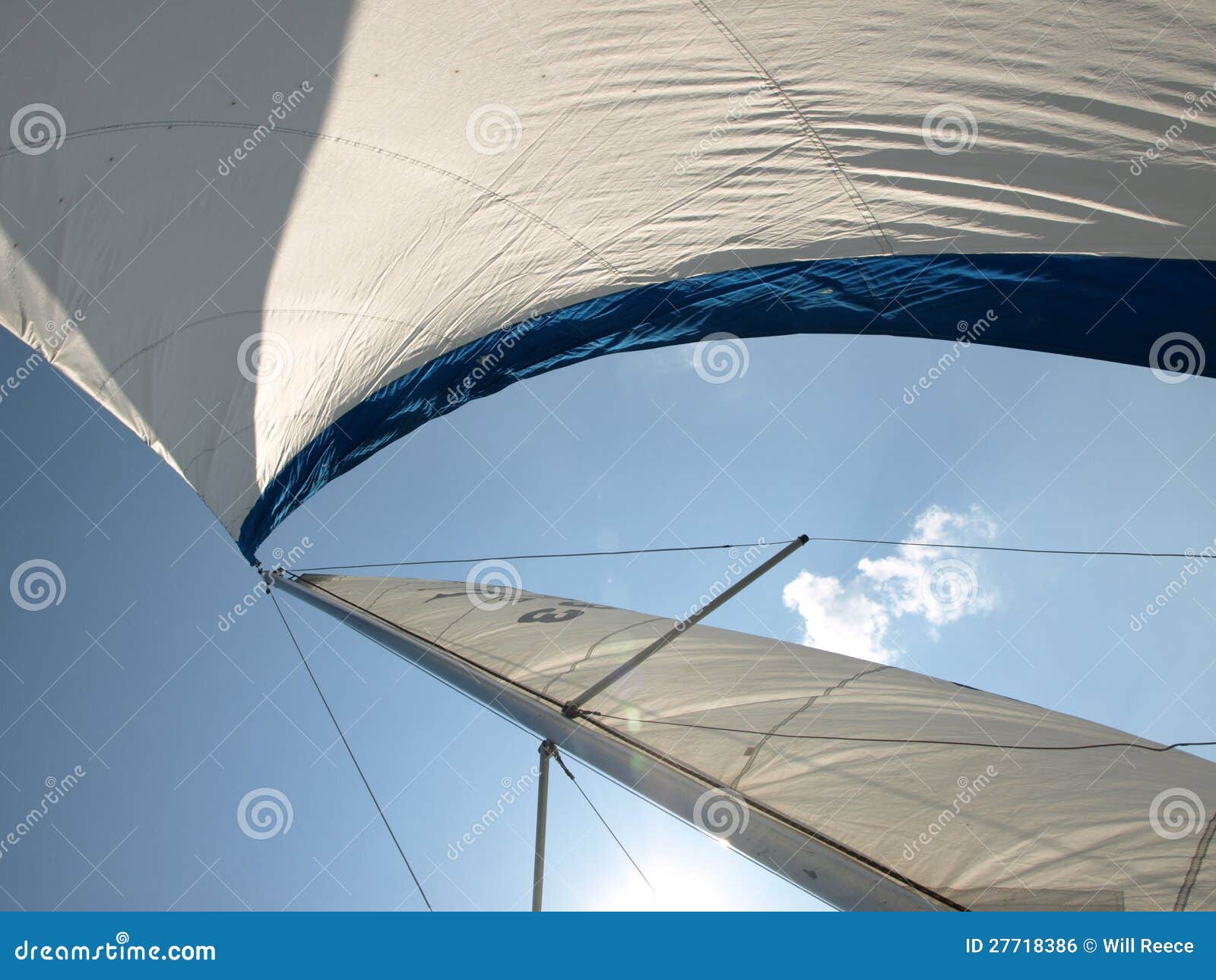 Wind in sails on sailboat stock photo. Image of sailing 27718386