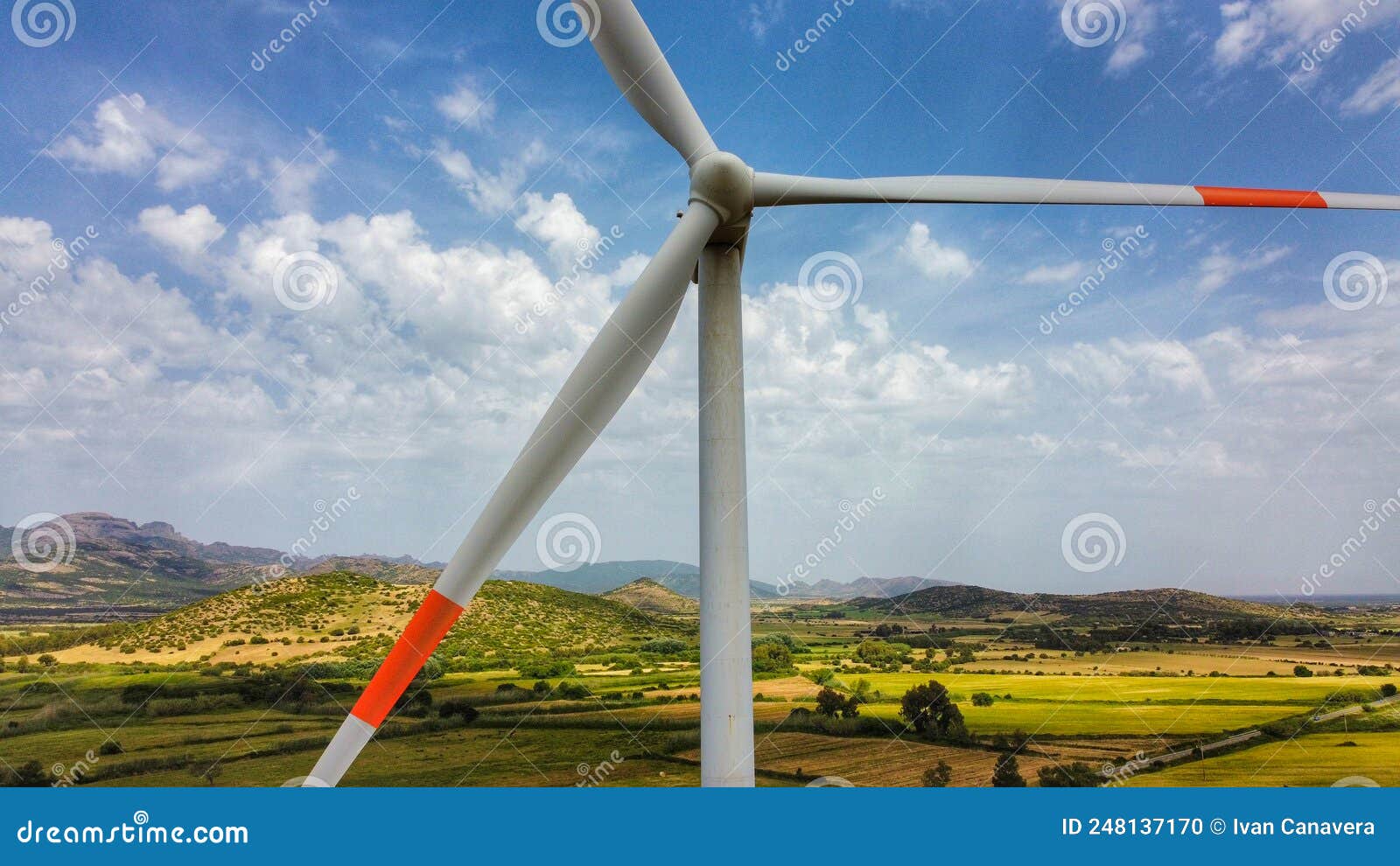 wind turbine with a cloudy and gray sky, villacidro