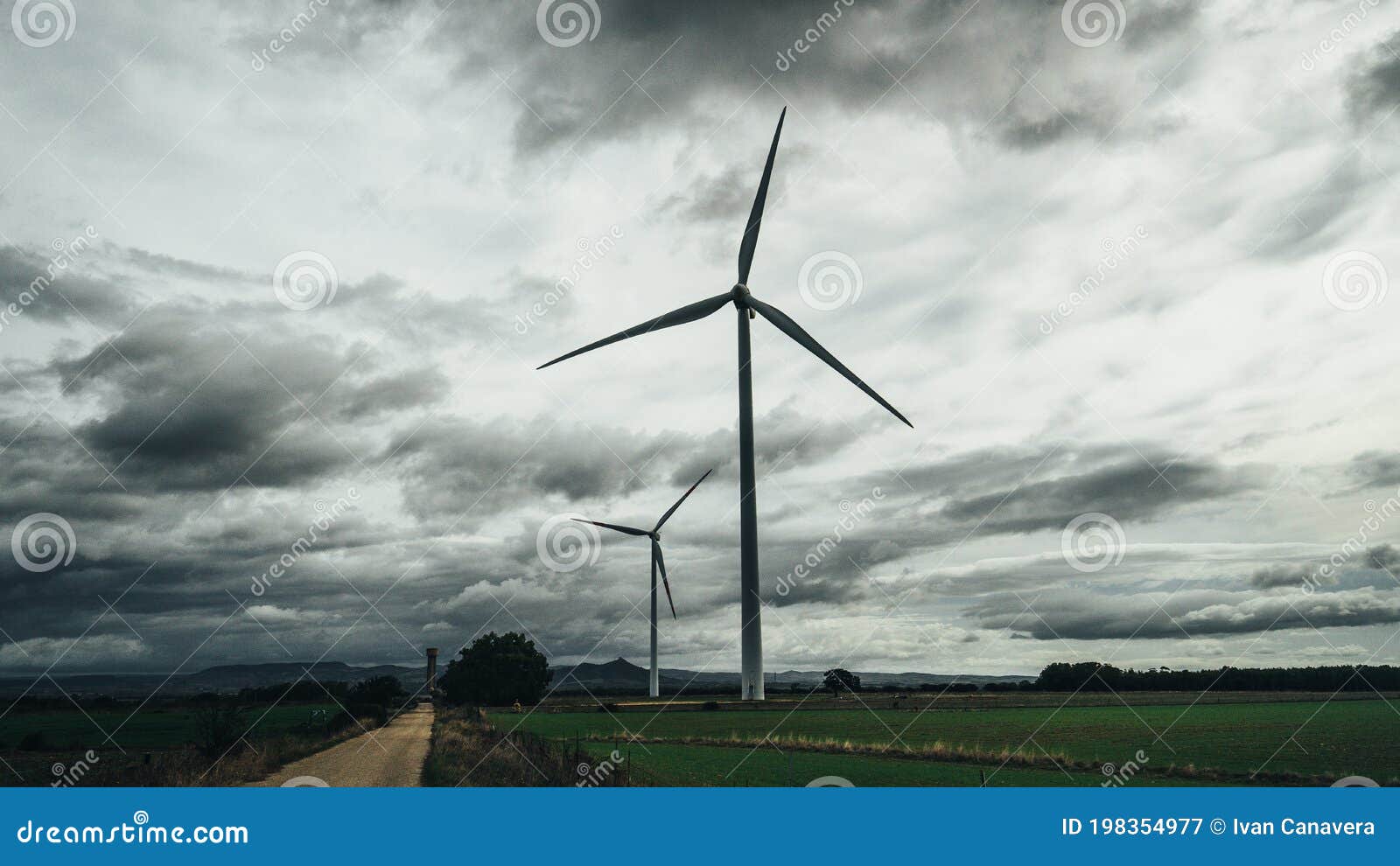 wind turbine with a cloudy and gray sky