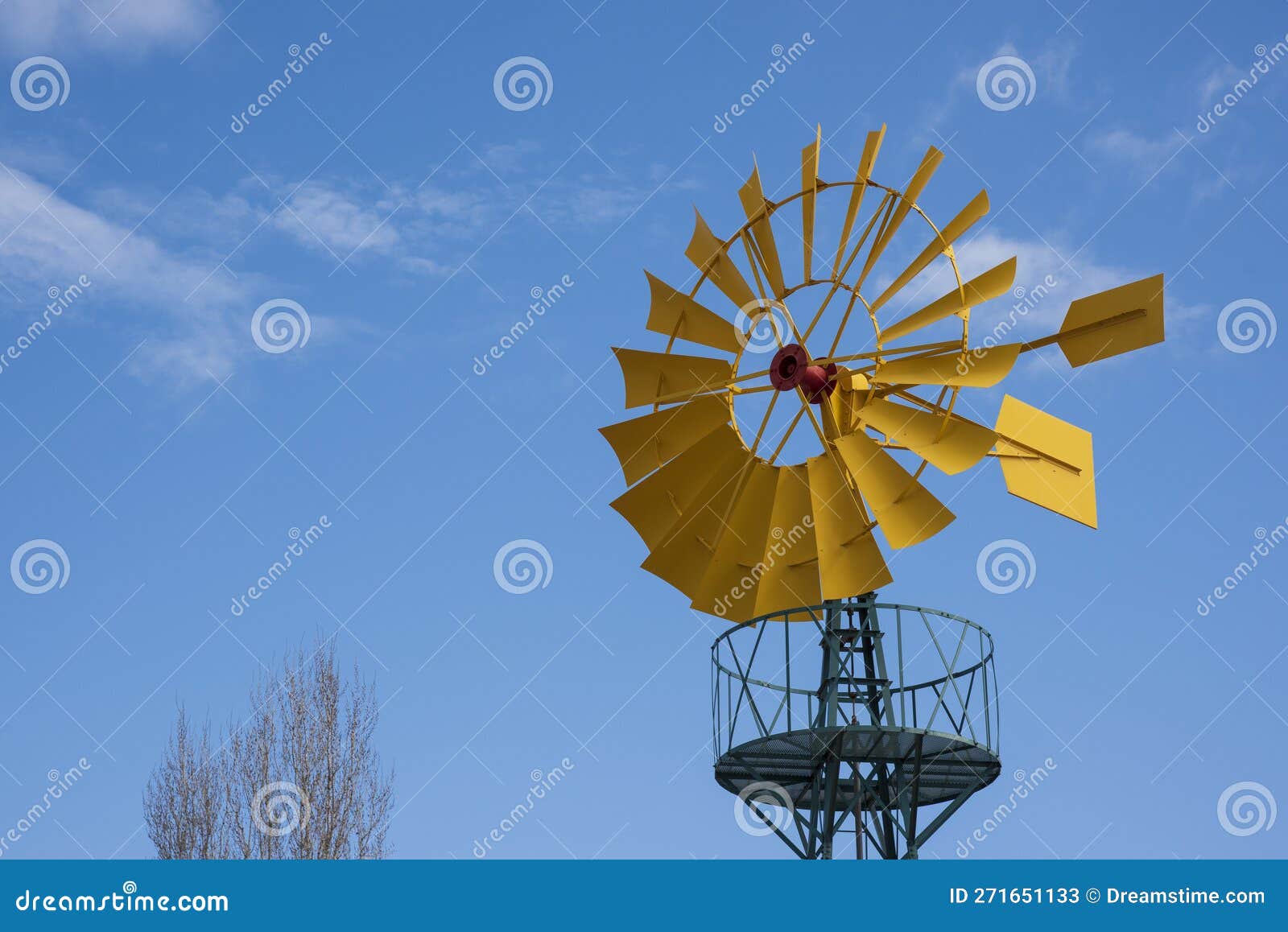 wind turbine, with the yellow blades producing energy