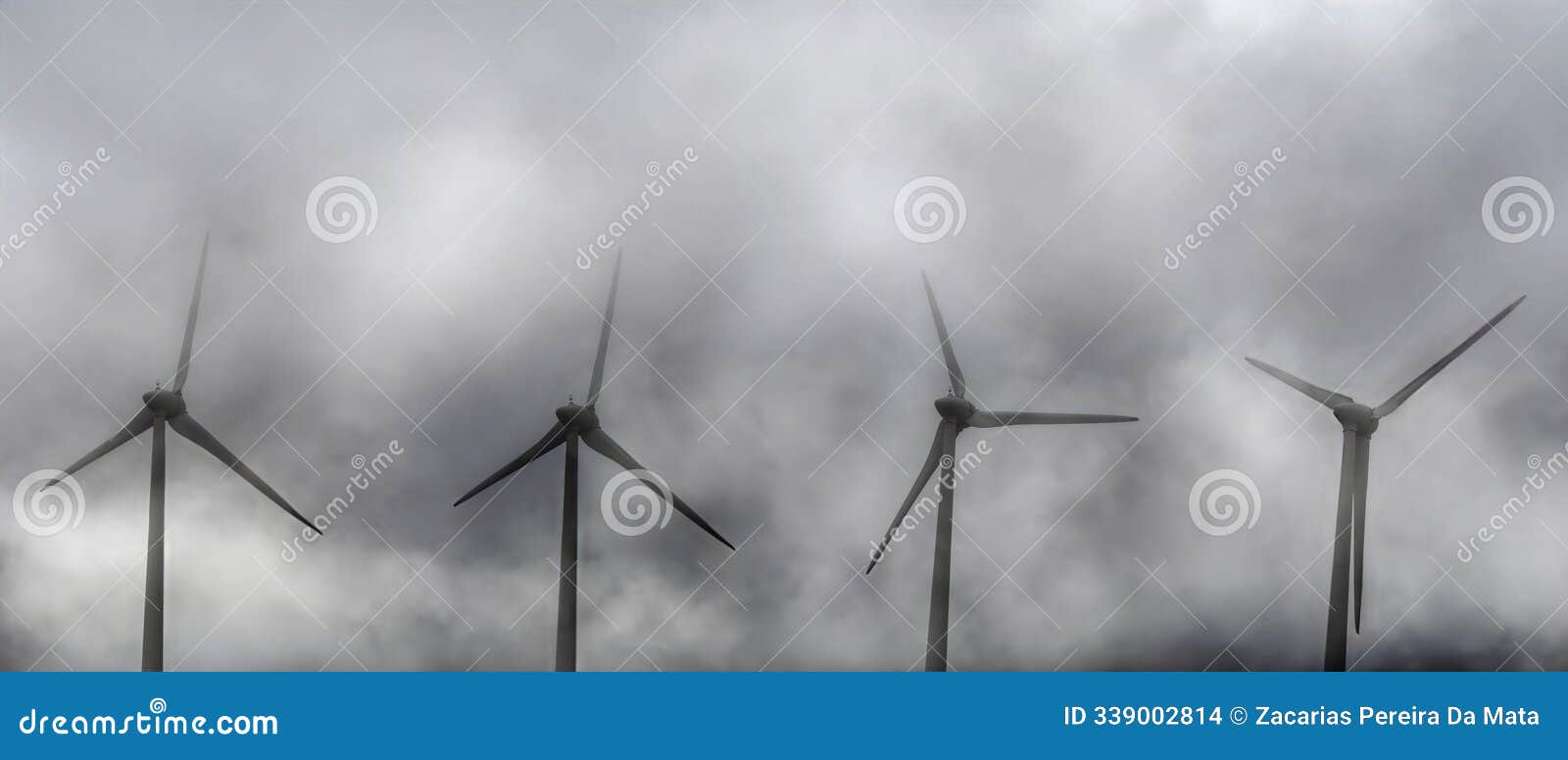 wind turbines in the fog