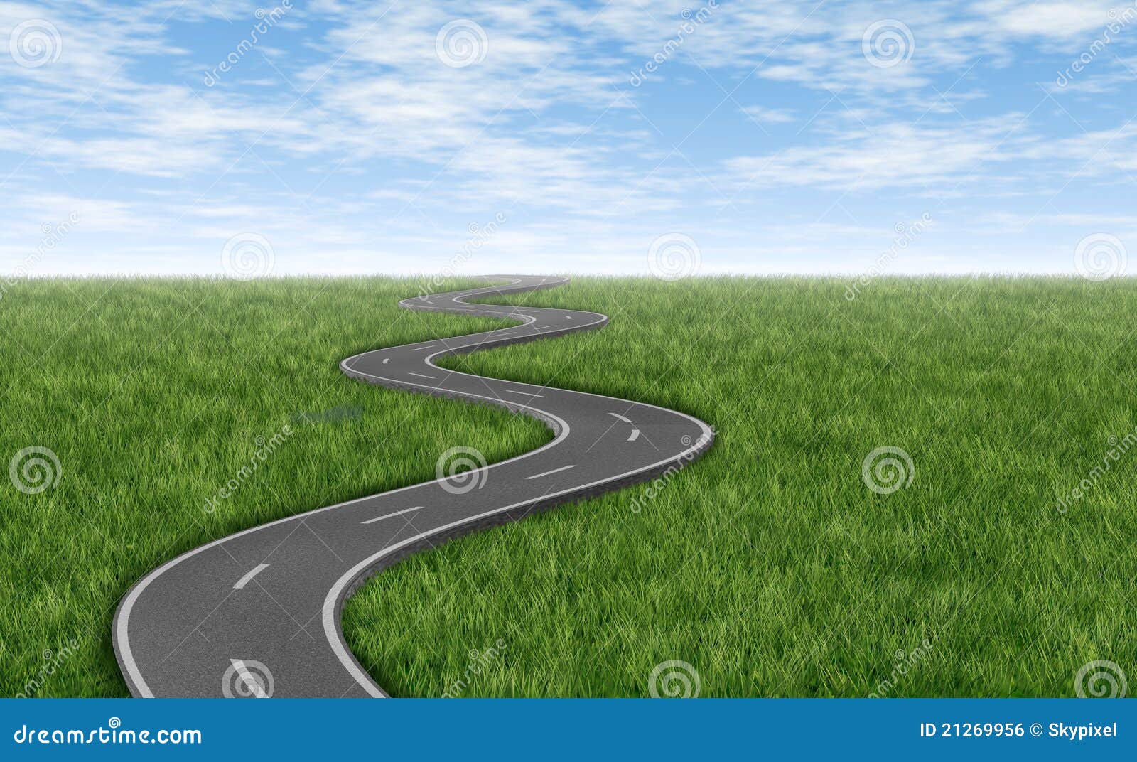 winding road on green grass horizon