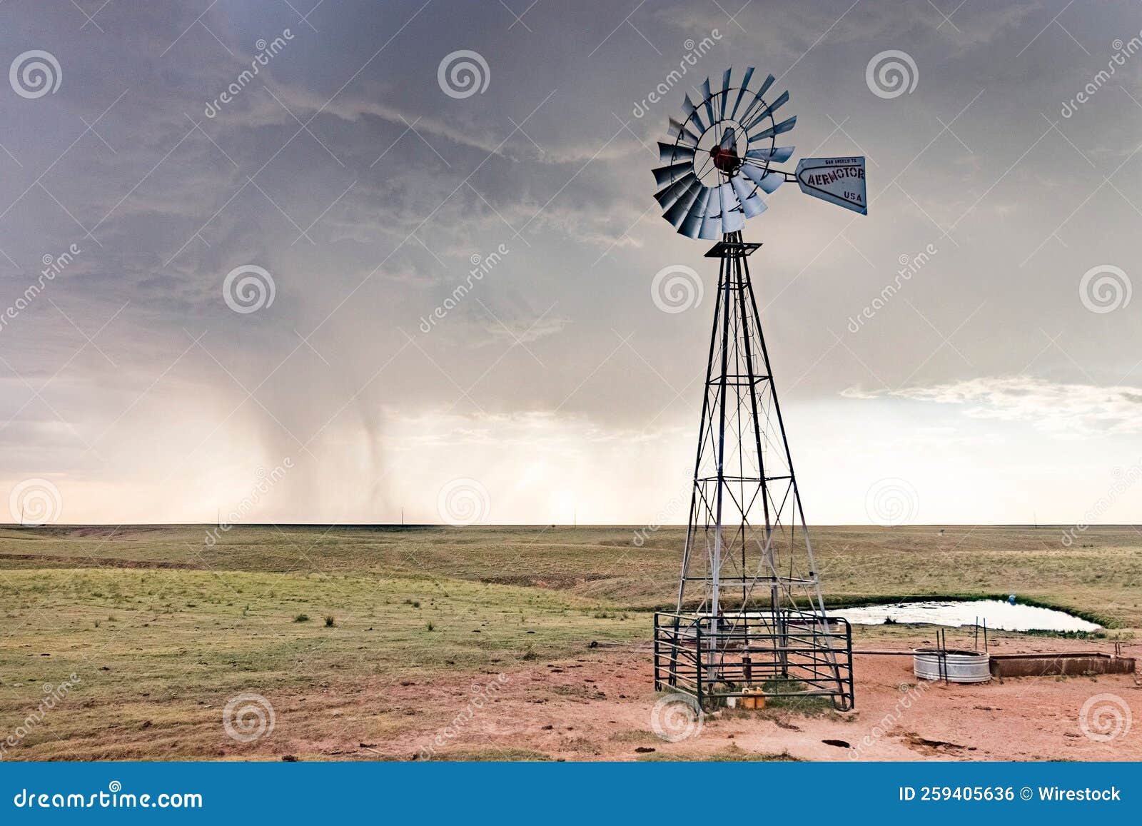 Windmill Continues To Pump Water in Field Editorial Photo Image of