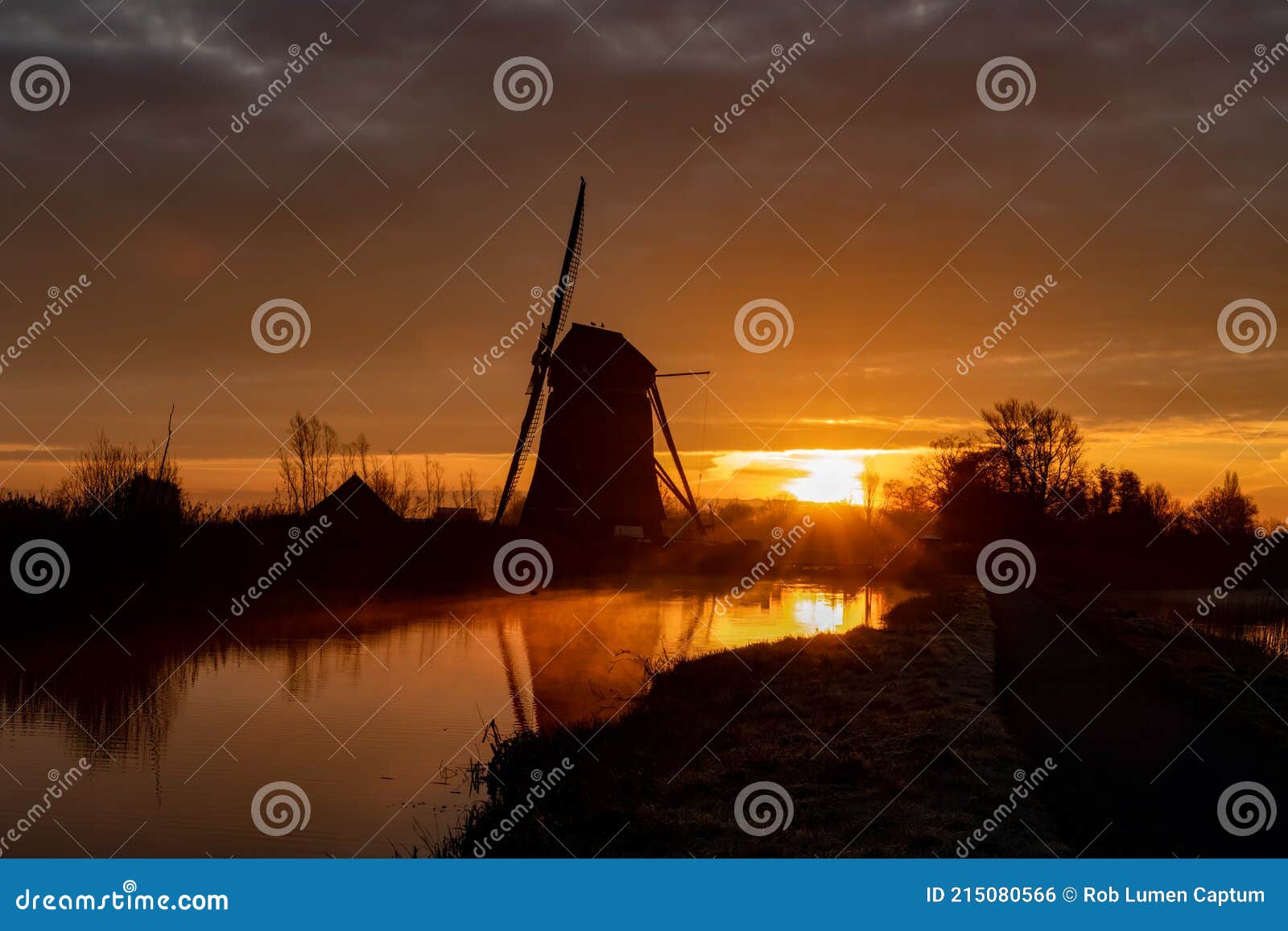 windmill at early sunrise, de rietveldse molen, hazerswoude dorp
