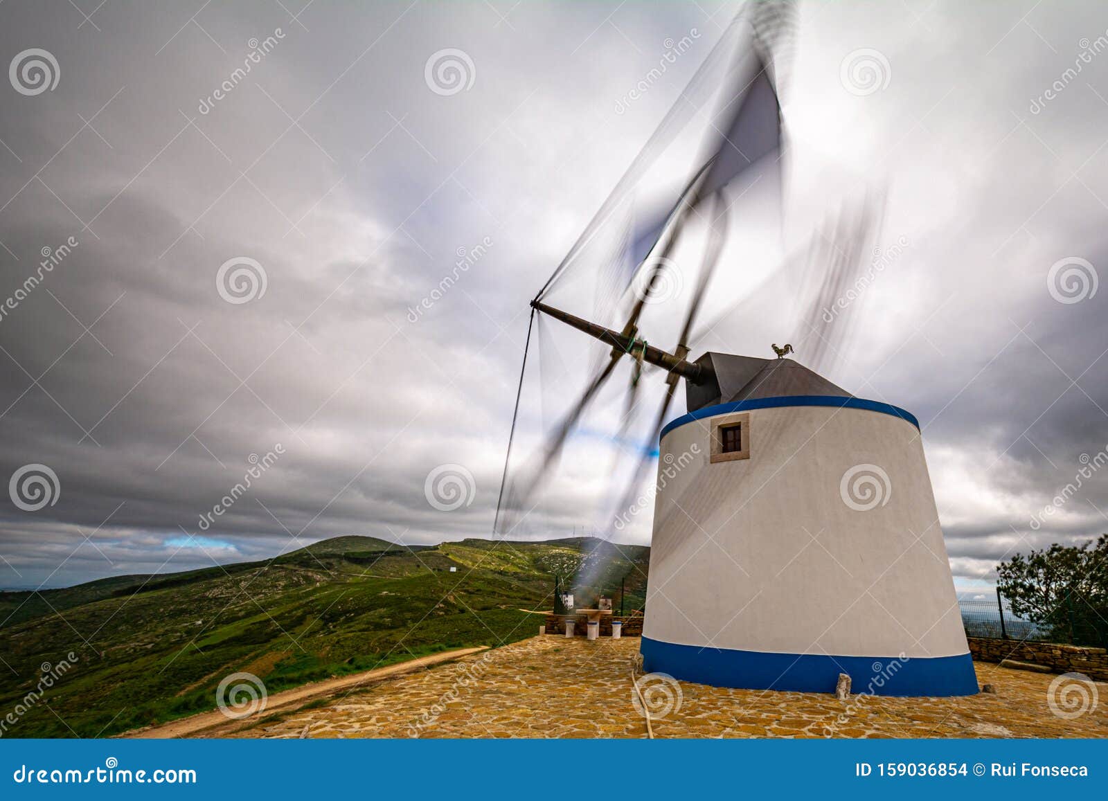 windmill in portuguese mountain. moinho de vento em paisagem portuguesa.