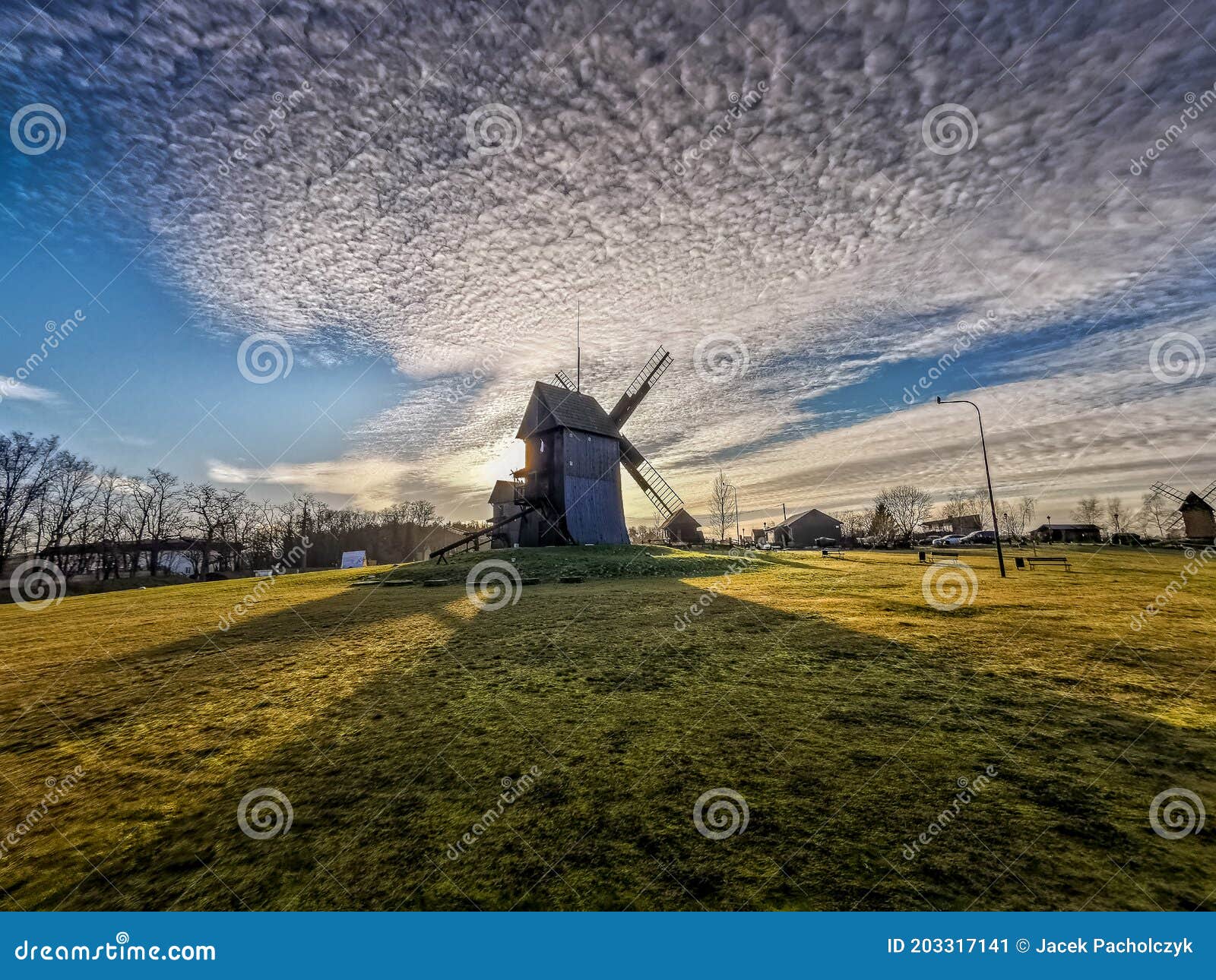 wooden windmill in the cloud