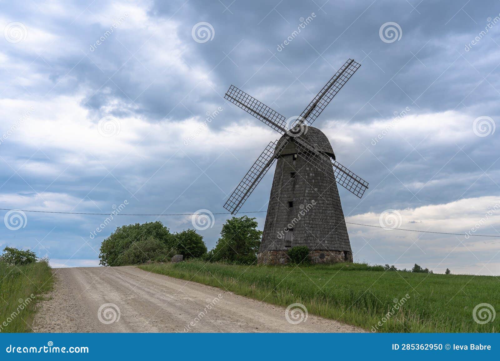 Windmills at the End of the Hill Stock Photo Image of hill, field