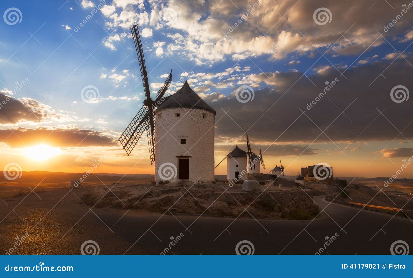 windmills at sunset, consuegra, castile-la mancha, spain