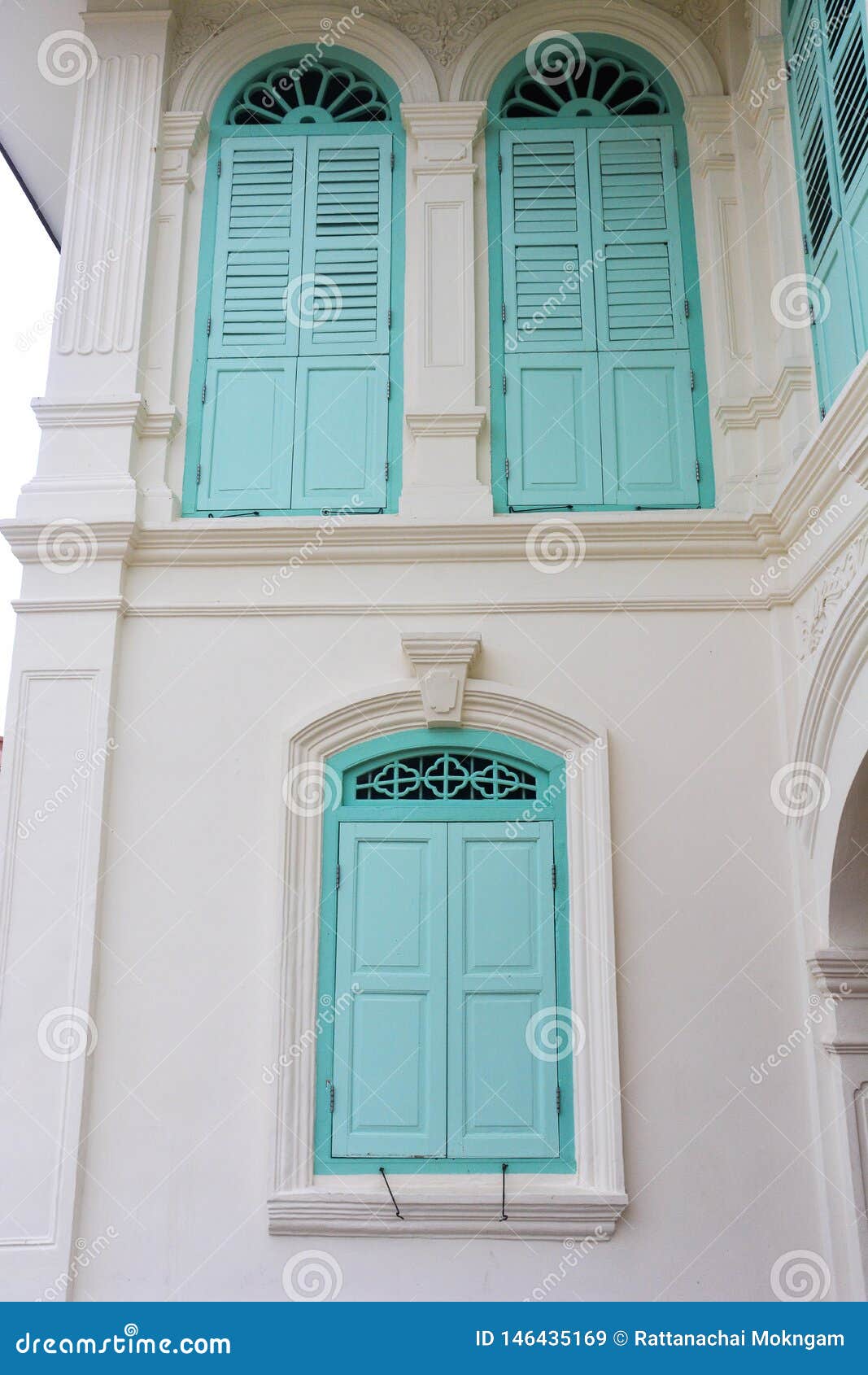 closed green window in chino-portuguese style