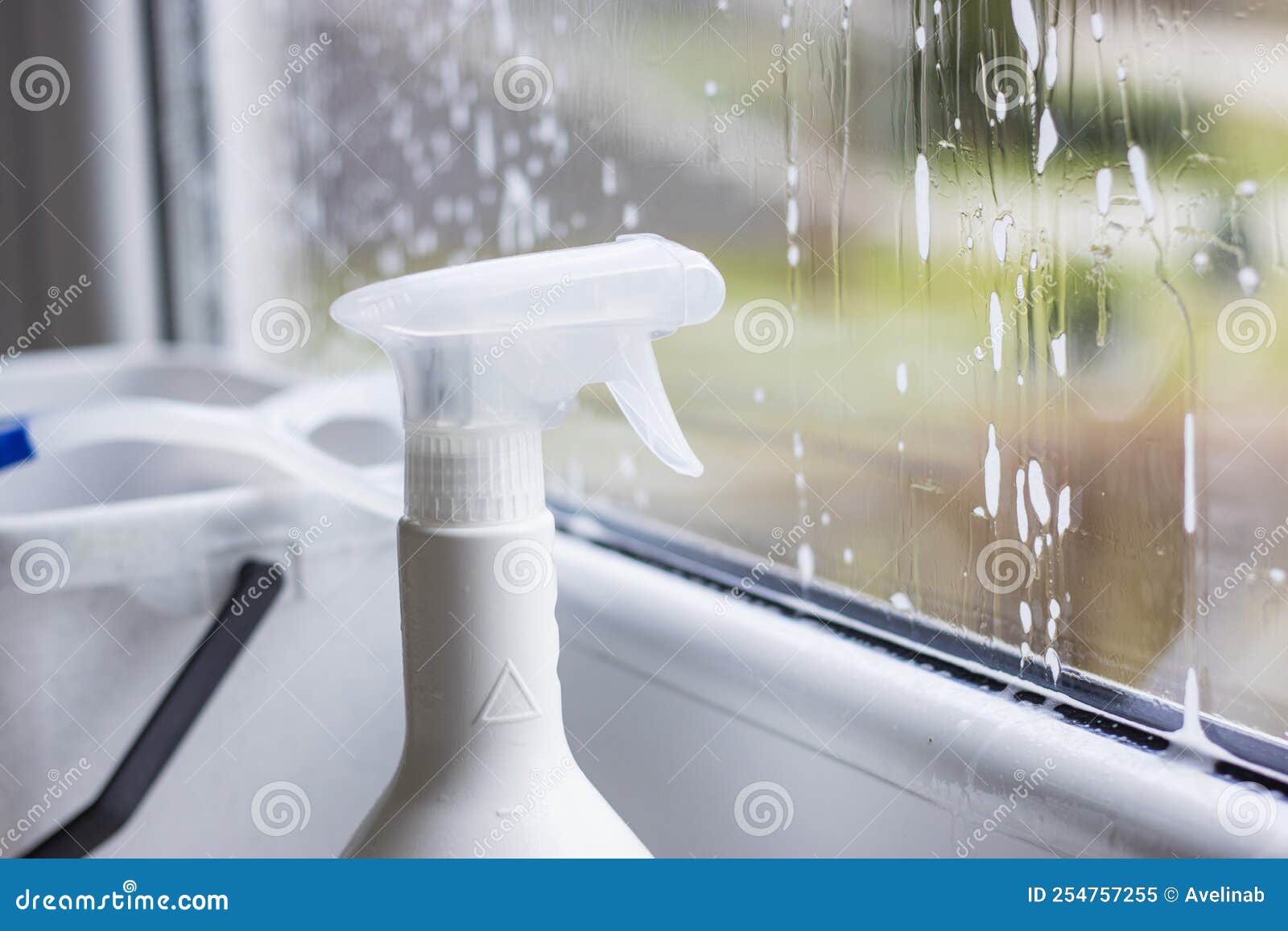 Window Cleaning Detergent. Washing the Glass on the Windows with