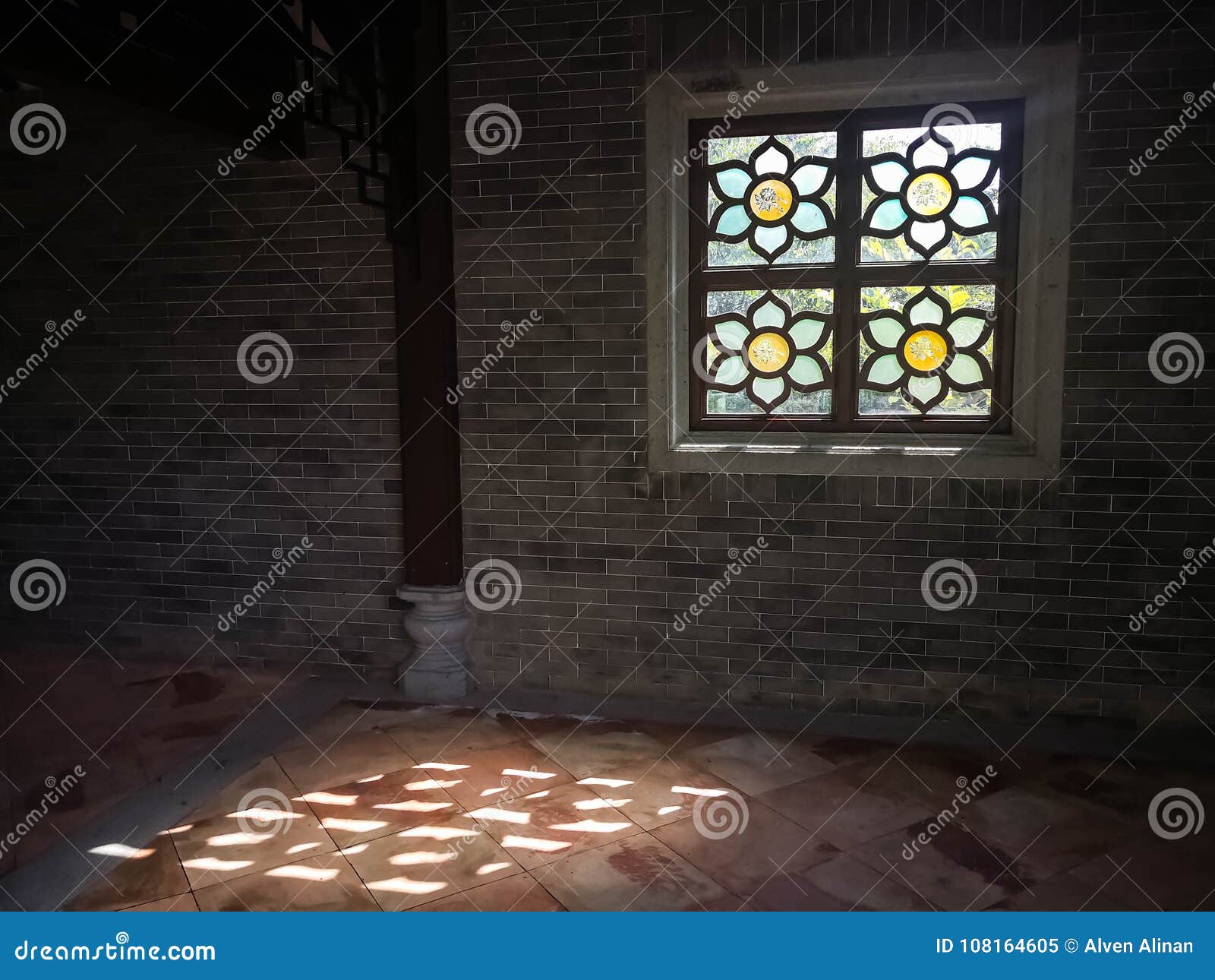 A Window In A Chinese Garden With Flower Designs Stock Image