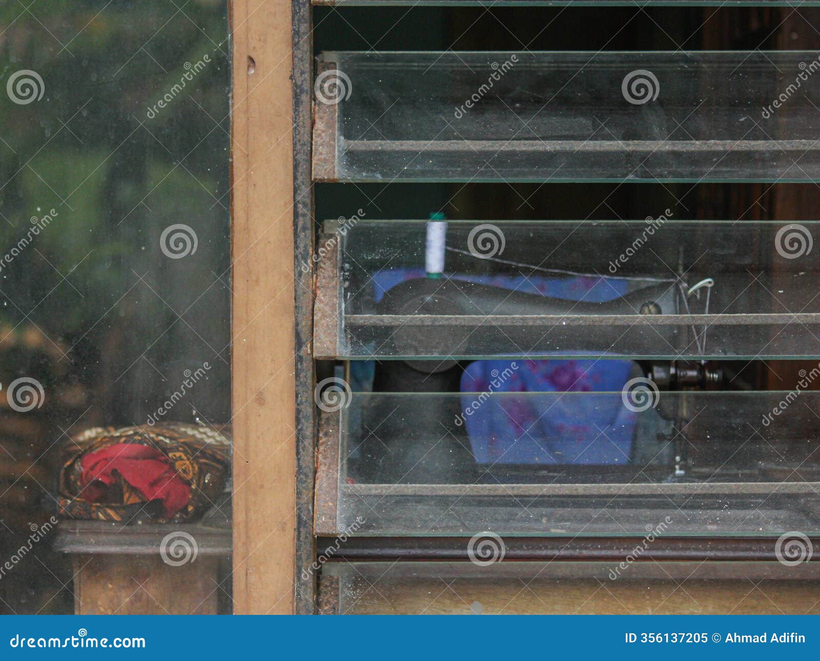 window with old sewing machine