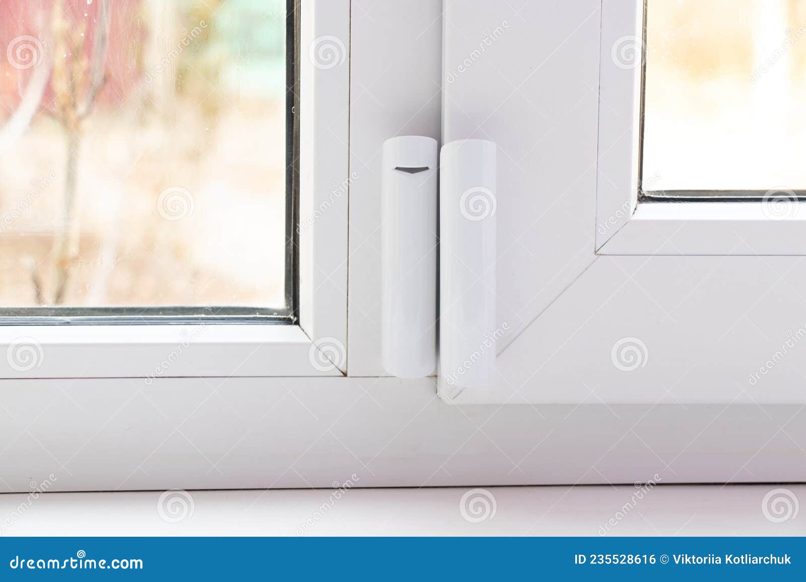 window opening sensor hanging on the window, home alarm system, home protection