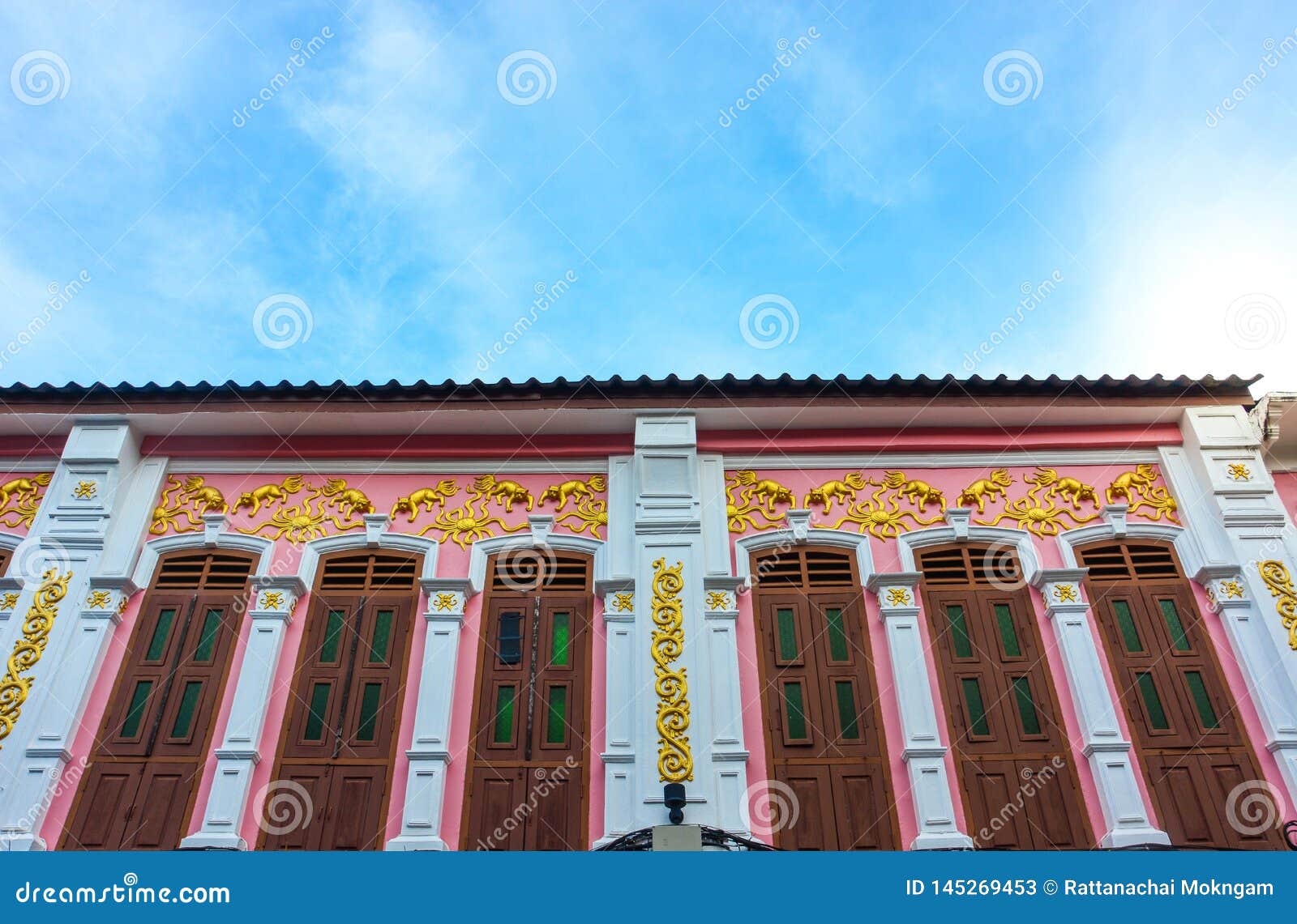 window with pink background in chino-portuguese style, old town, phuket, thailand