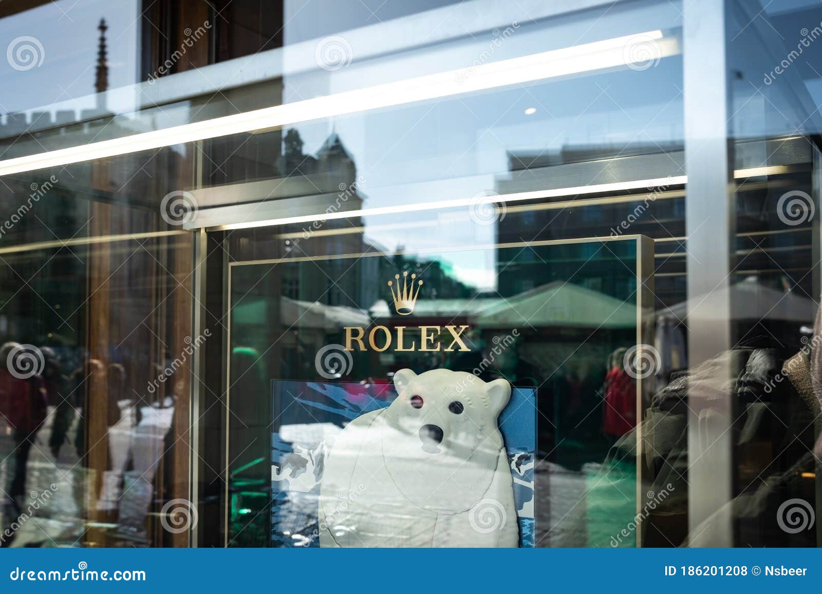 Window Shopping View of a Well Know, Luxury Watch Brand Logo Seen at a  Jewellers Window Display. Editorial Stock Photo - Image of luxury, glazing:  186201208