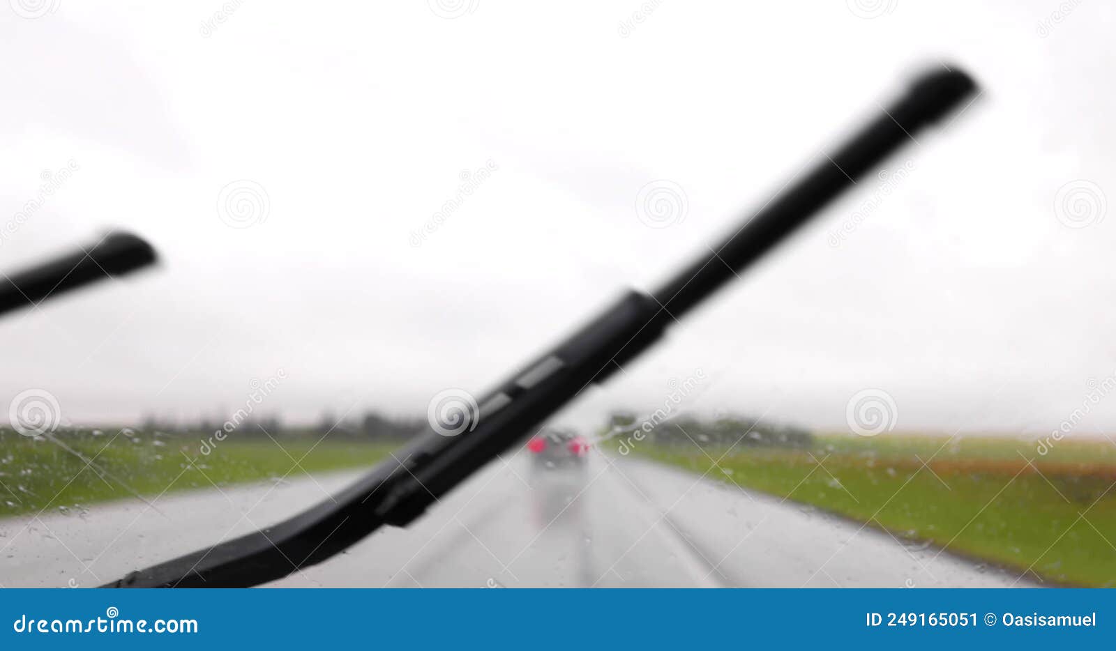 Windshield Windscreen Wipers Working during a Rainy Road Trip Stock