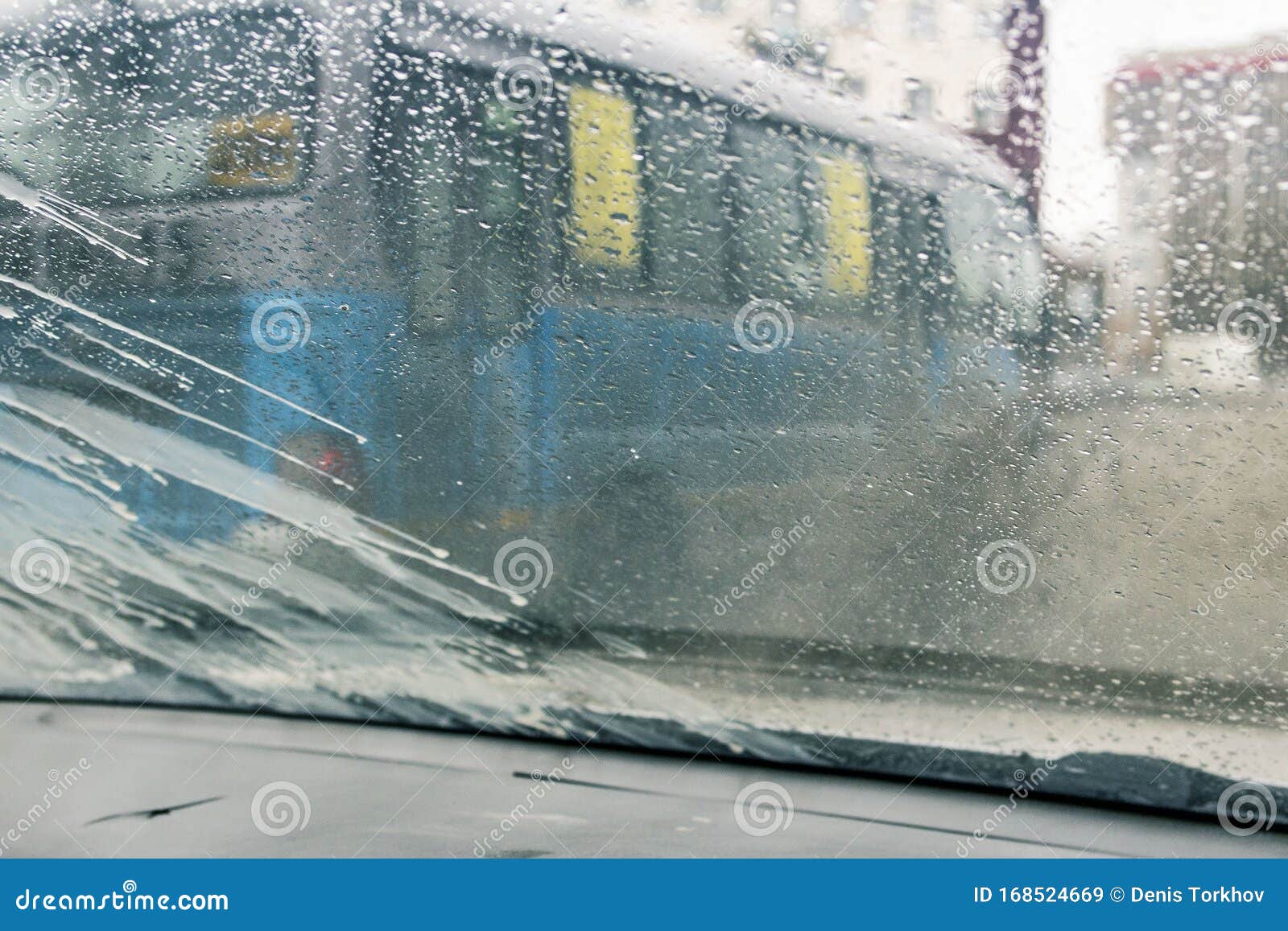 Windshield Wipers from Inside of Car, Season Rain. the Front and