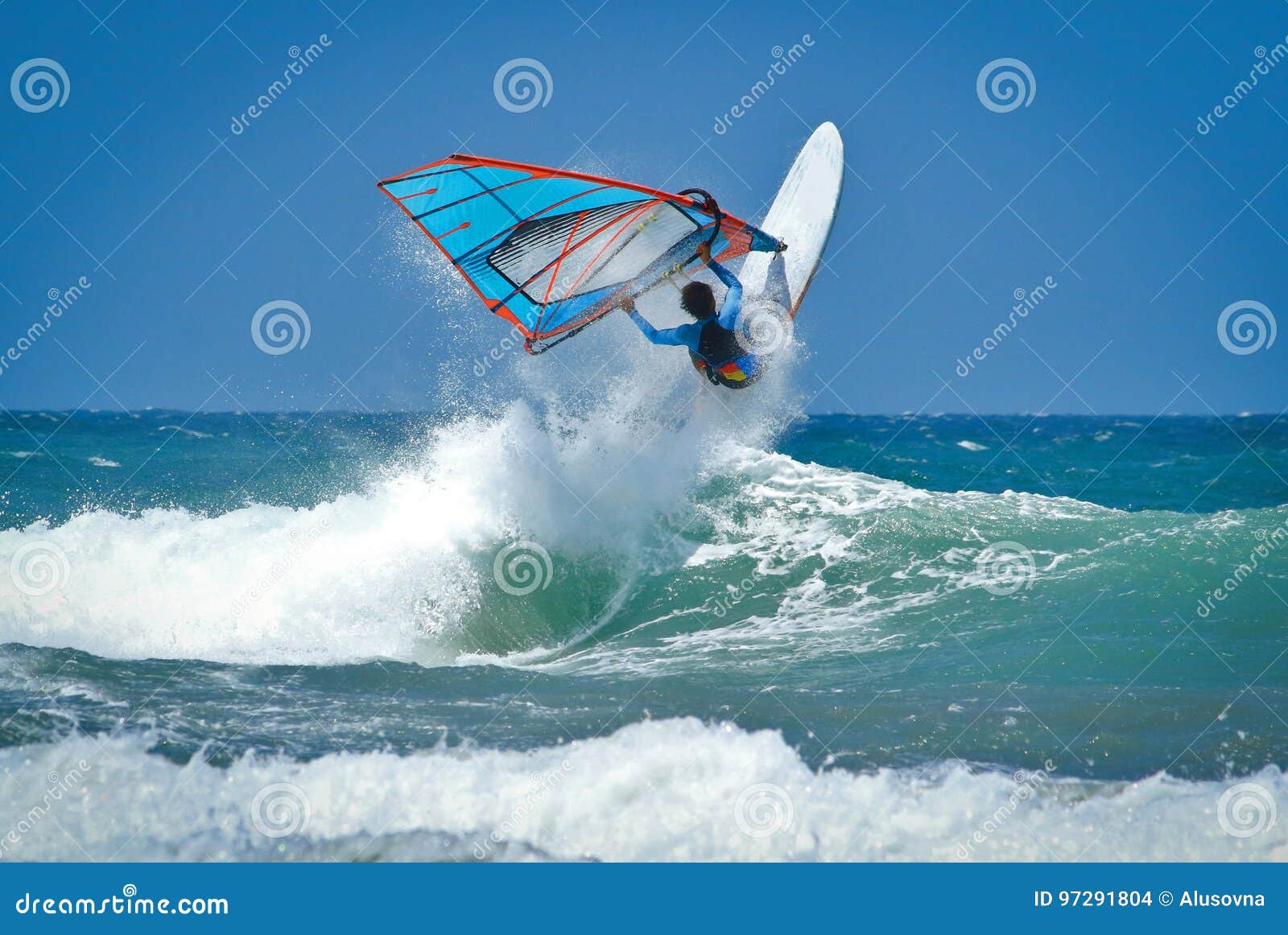 Windsurfing Jumps Out of the Water Stock Photo Image of fast, sail
