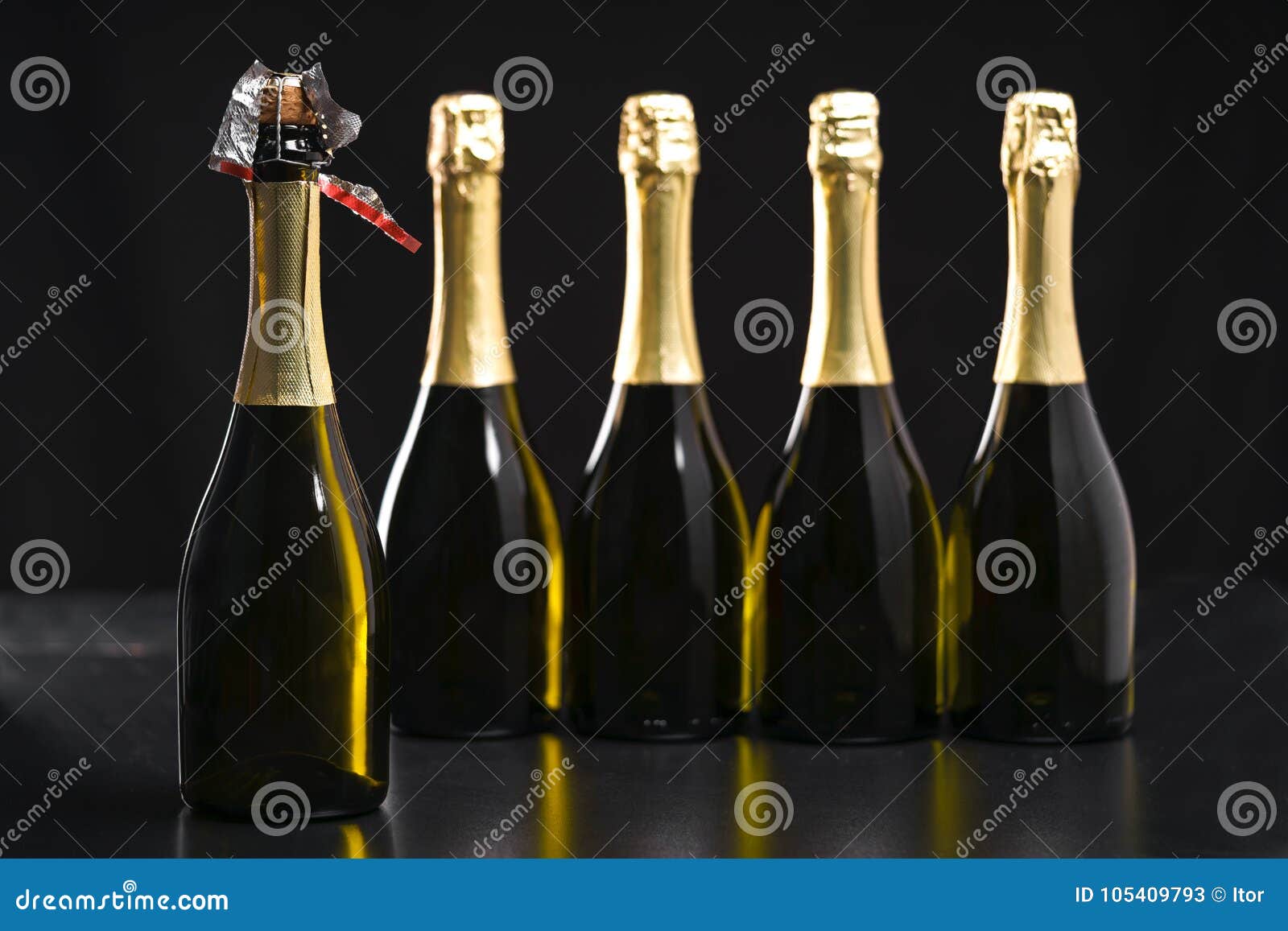 Bottles Of Champagne On A Black Background. Selective Focus Stock Image