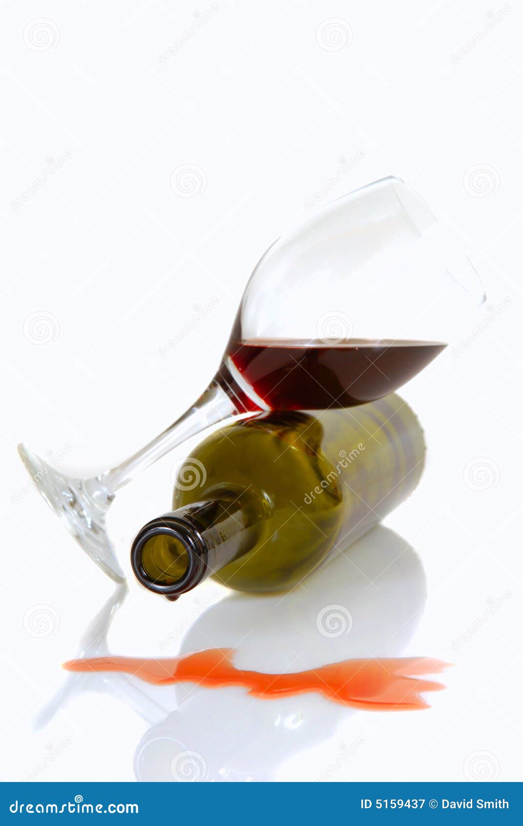 Wine Bottle and Glass Resting on Their Sides Stock Image Image of