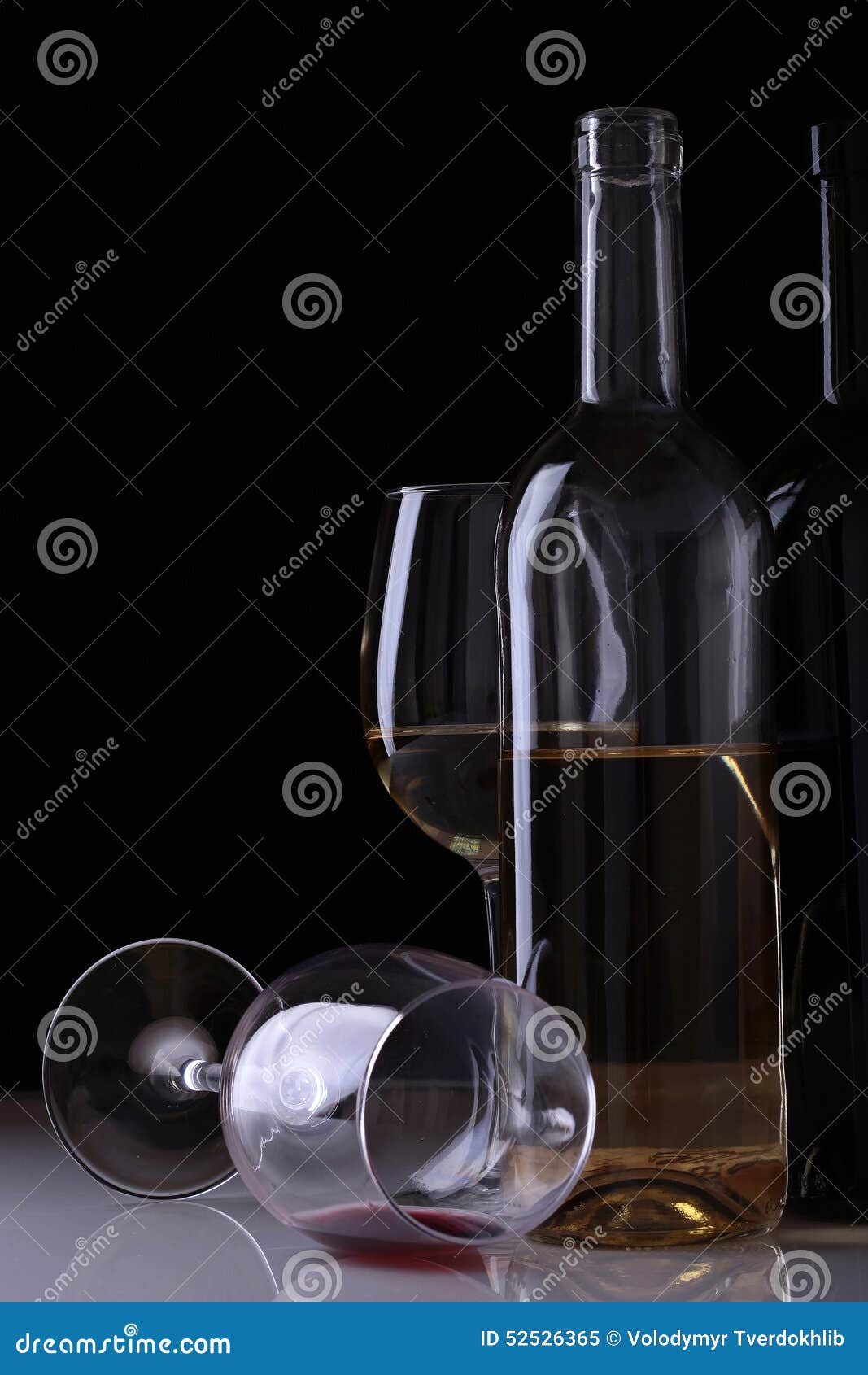 Wine bottles and glasses stock image. Image of liquid 52526365