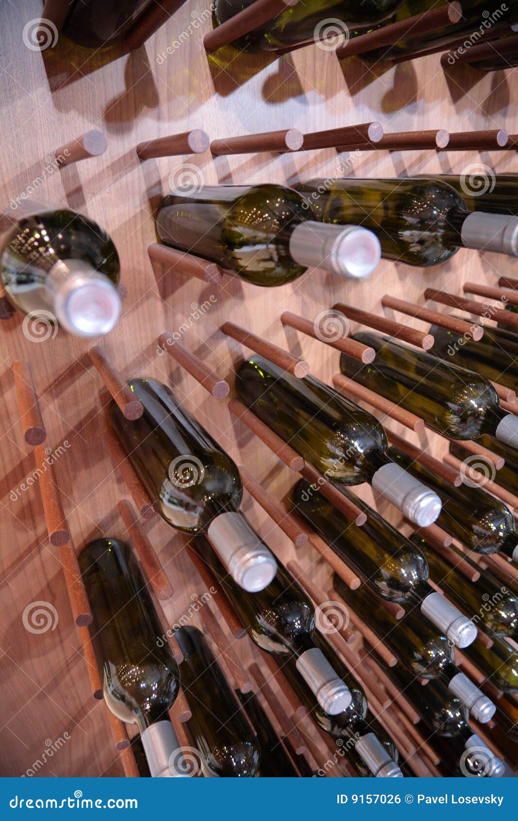 Wine bottles on wall stock photo. Image of horizontal 9157026