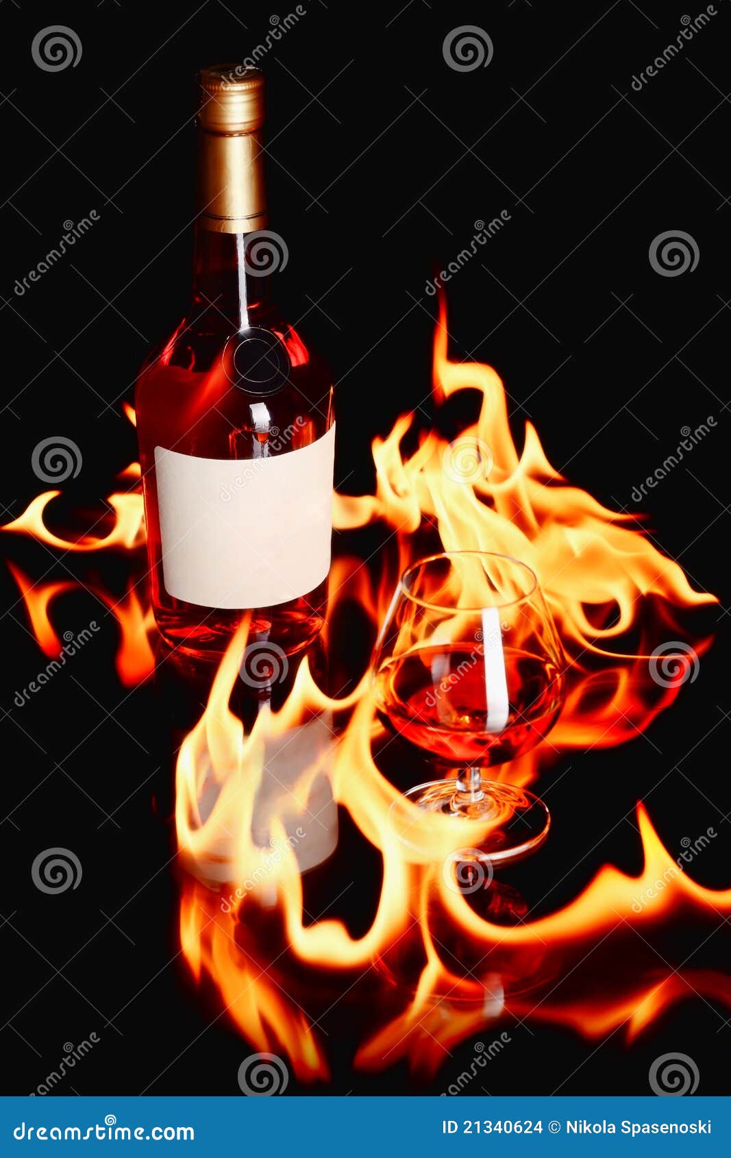 Wine brandy in fire stock photo. Image of elegant, glass 21340624