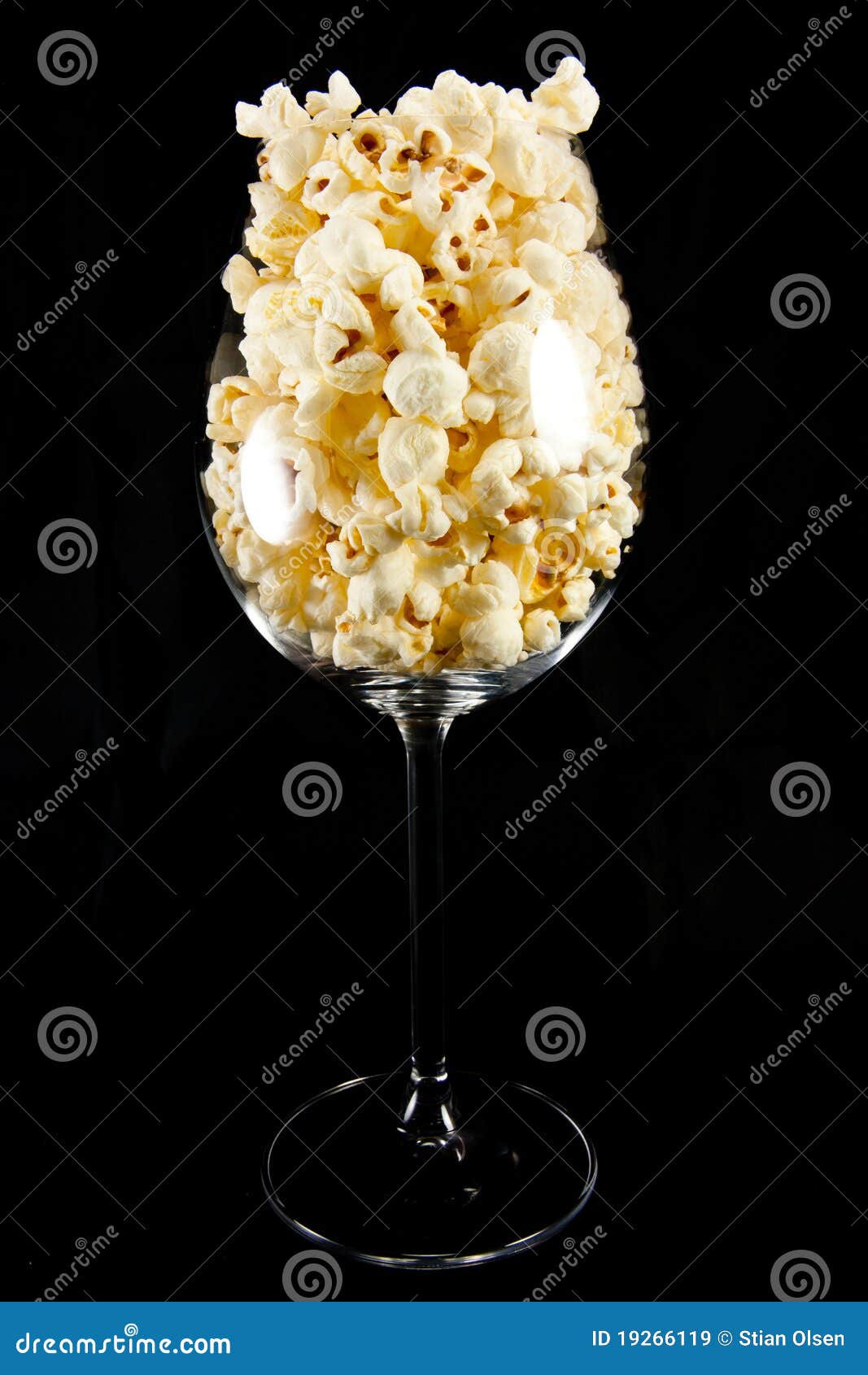 Wine glass with popcorn stock image. Image of black, organic 19266119