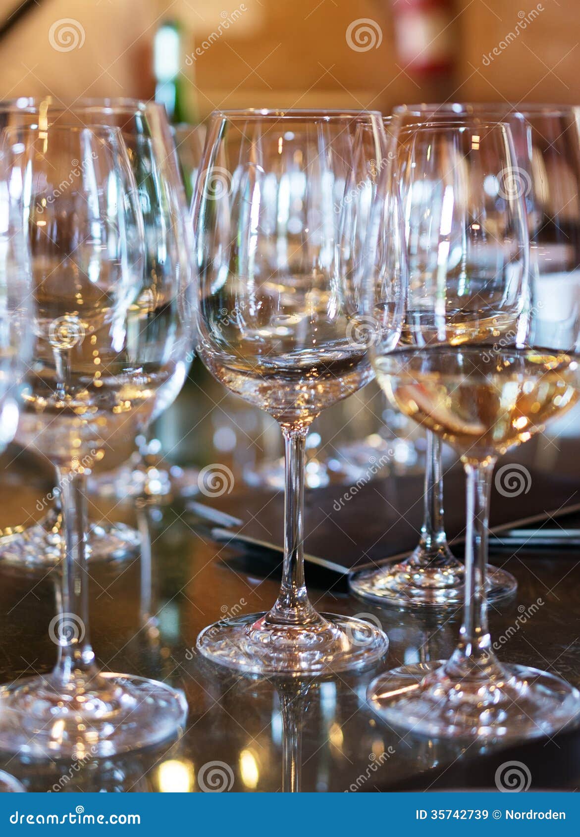 Wine glasses on the table. stock image. Image of luxury 35742739