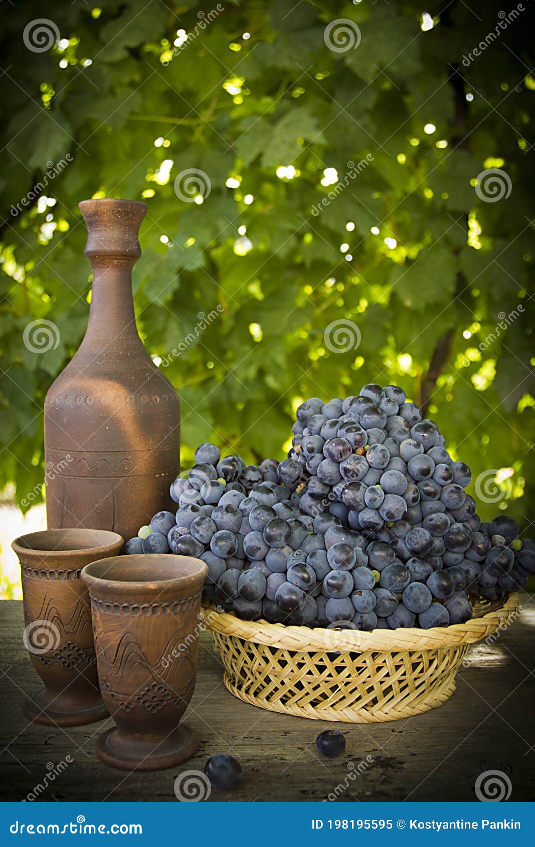 Wine in pottery and grapes stock image. Image of ceramic 198195595