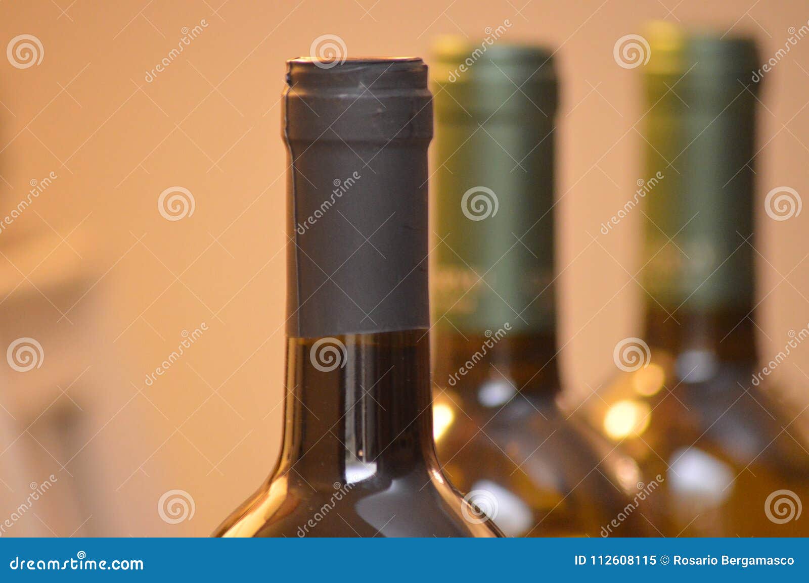 Wine red and white bottles stock image. Image of alchol 112608115