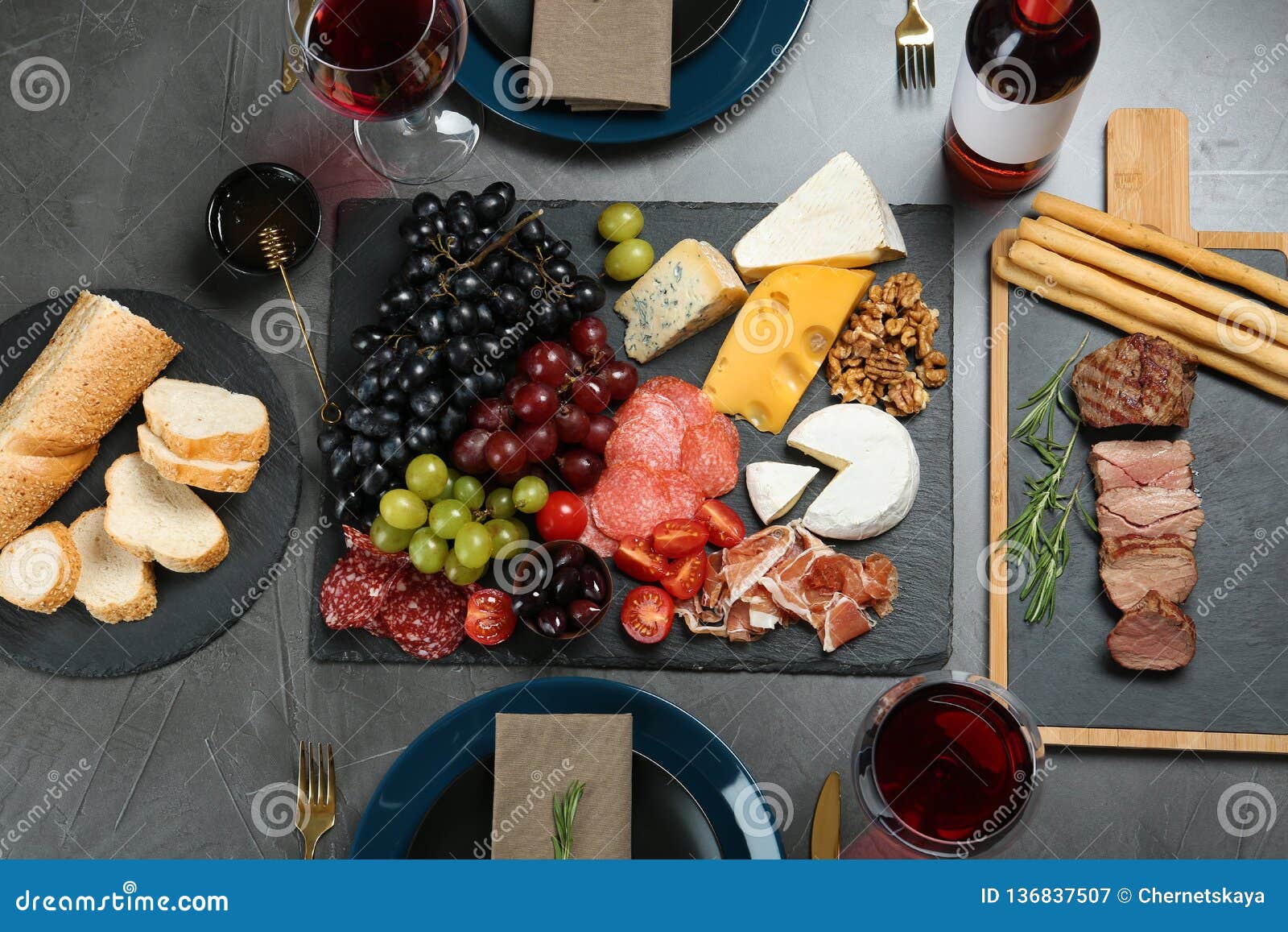Wine and Snacks Served for Dinner on Table in Restaurant Stock Image