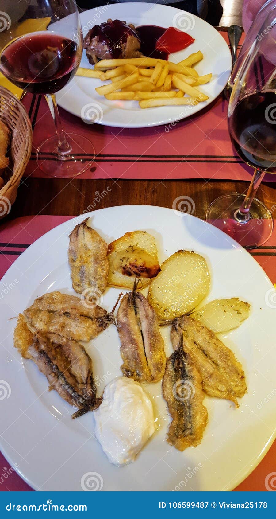 A full meal for two stock image. Image of people, fish - 106599487