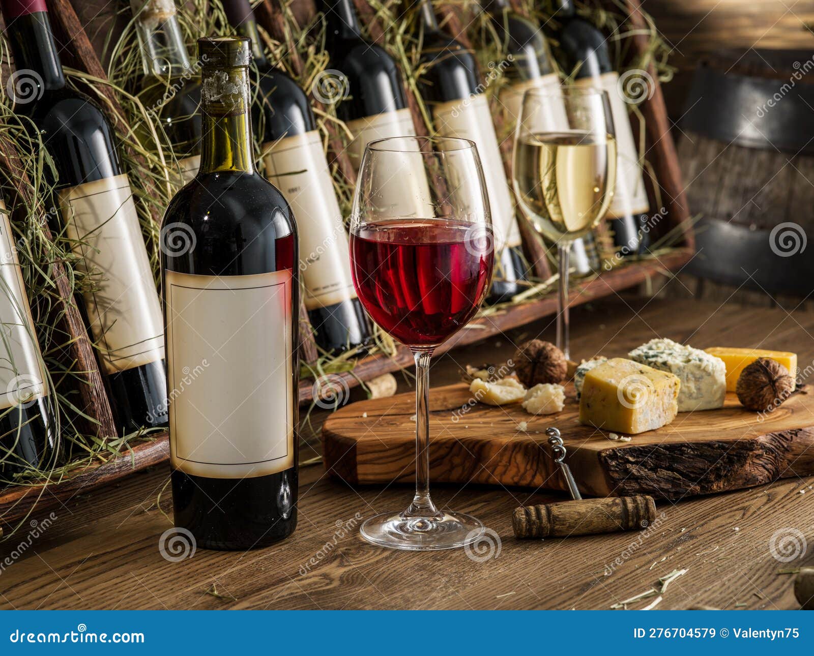 Wine Testing at the Storage. Glass of Wine and Wine Bottle in the Wine Cellar Stock Image