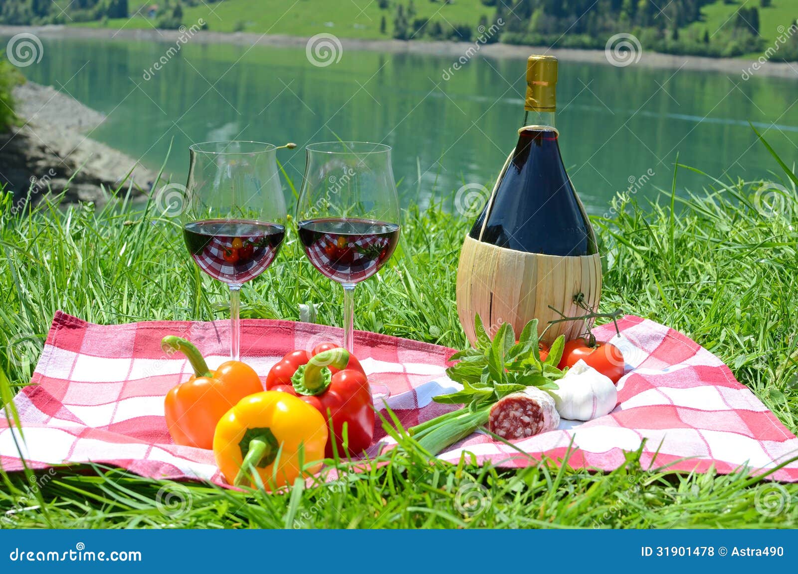 wine and vegetables served at a picnic