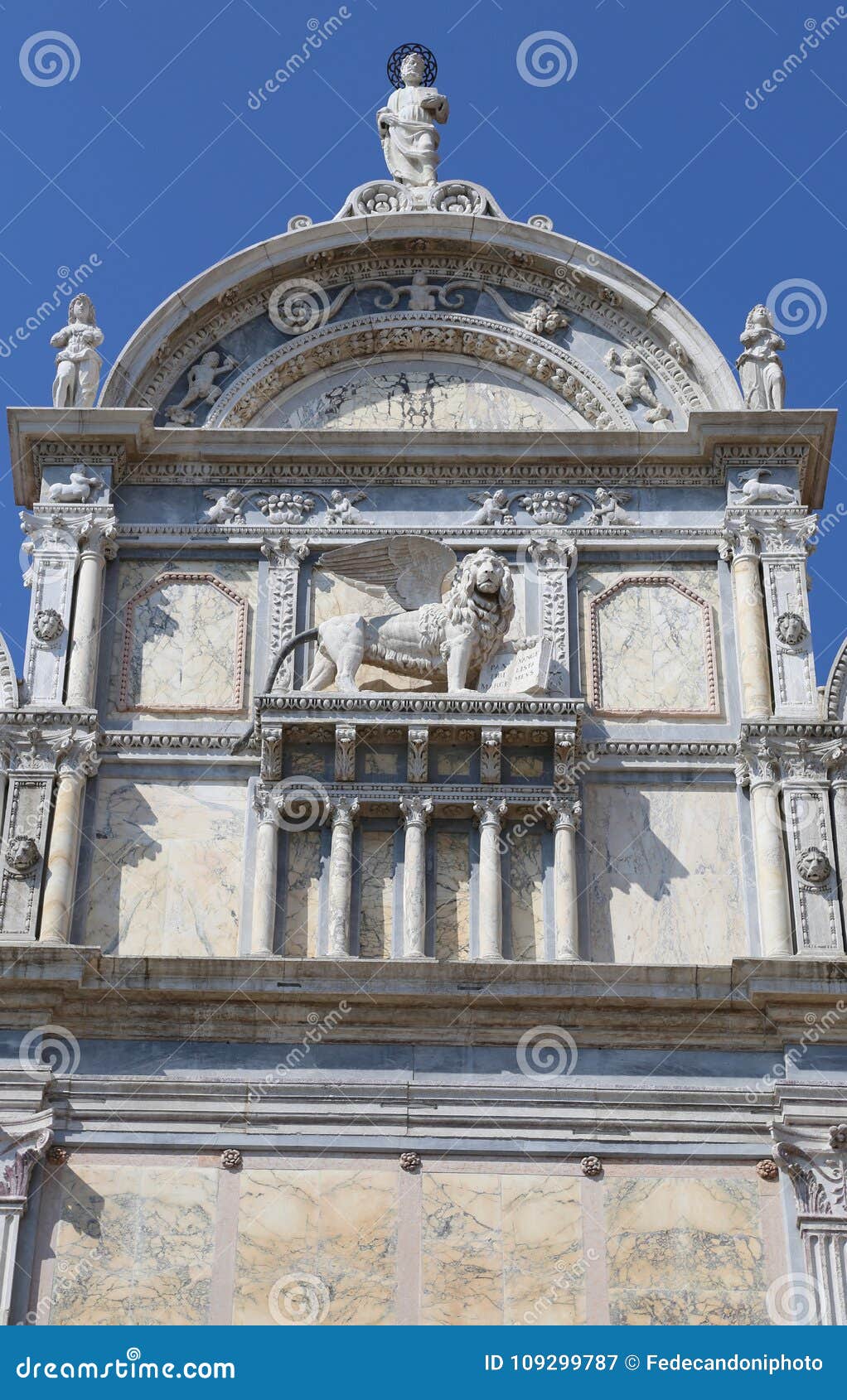 winged lion of the ancient building in venice called scuola gran