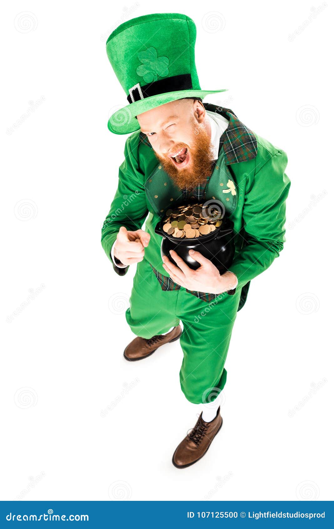 Winking Leprechaun in Green Suit Holding Pot of Gold Stock Photo ...