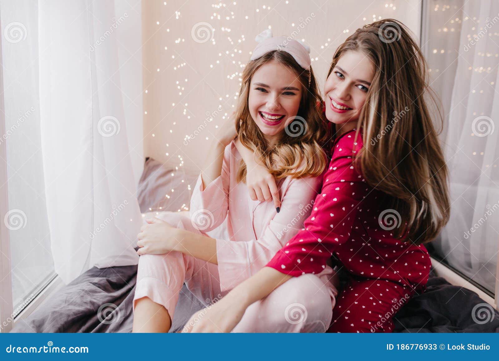 Winsome Dark-haired Girls Hugs with Best Friend in Morning. Adorable ...