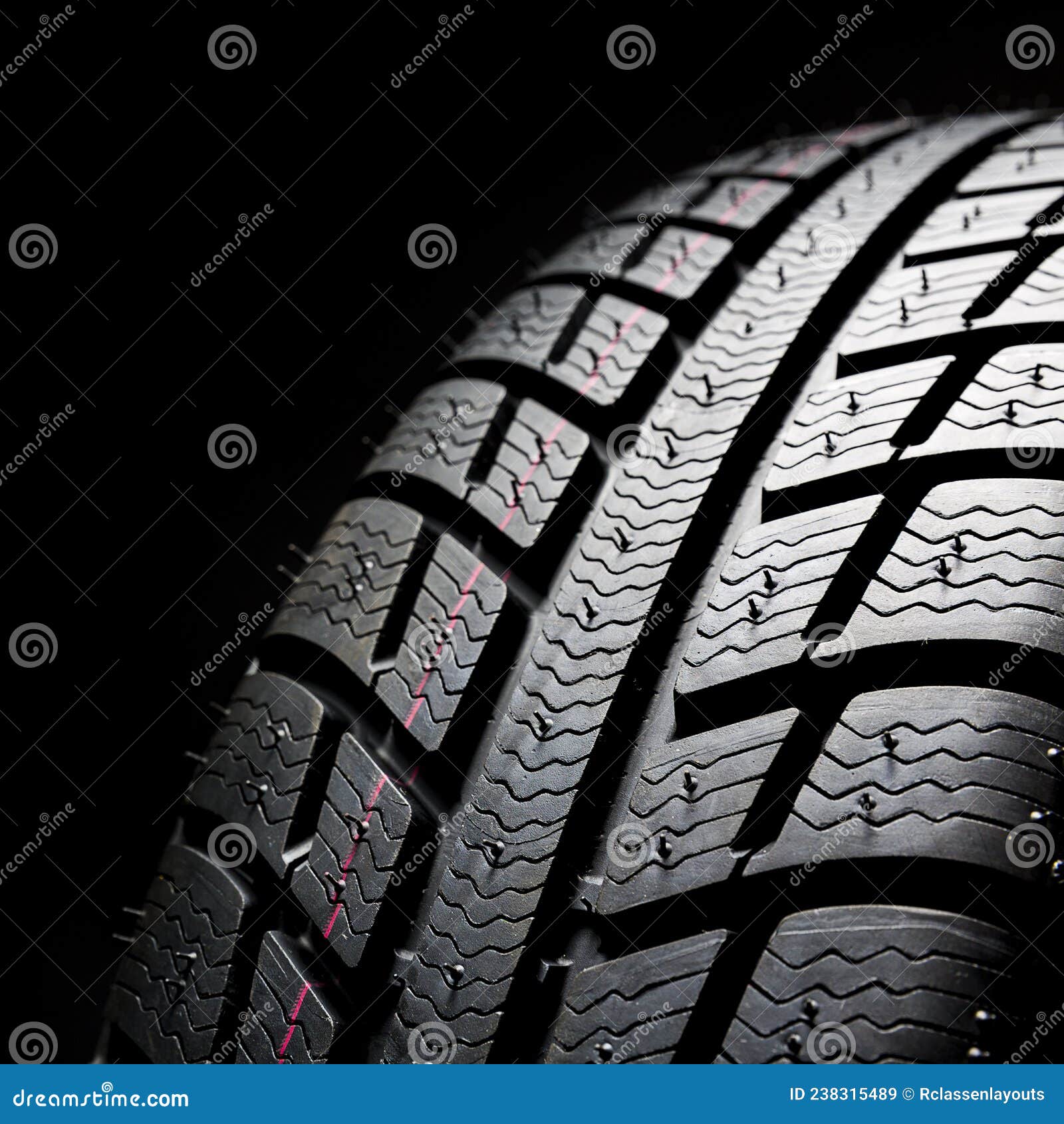 Winter Car Tires Closeup Wheel Profile Structure on Black Background