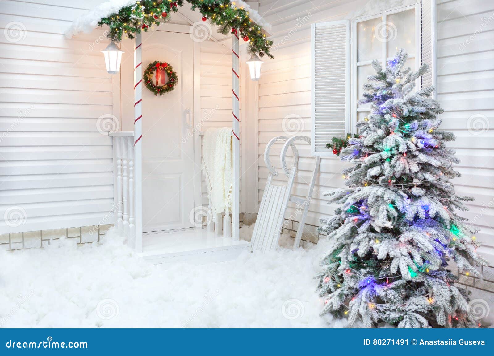 Winter Exterior of a Country House with Christmas Decorations in ...