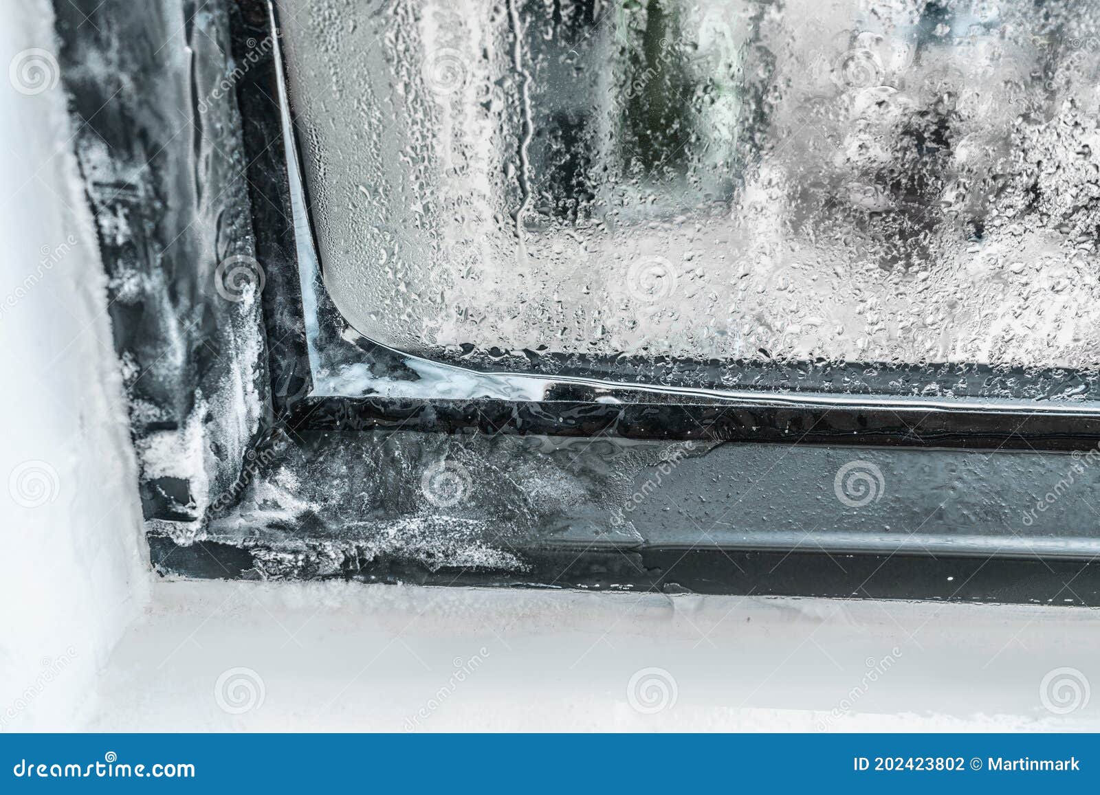 Winter Home Insulation Window Frost Problem. Condensation on House and Apartment Windows Causing