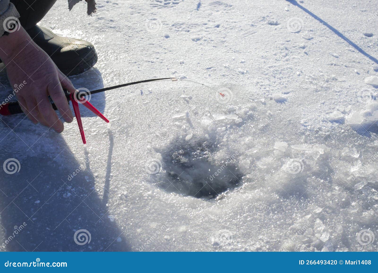 Winter Ice Fishing. Ice Fishing Winter Fishing Rod Stands Near Hole in Ice  River Stock Photo - Image of hook, activity: 266493420