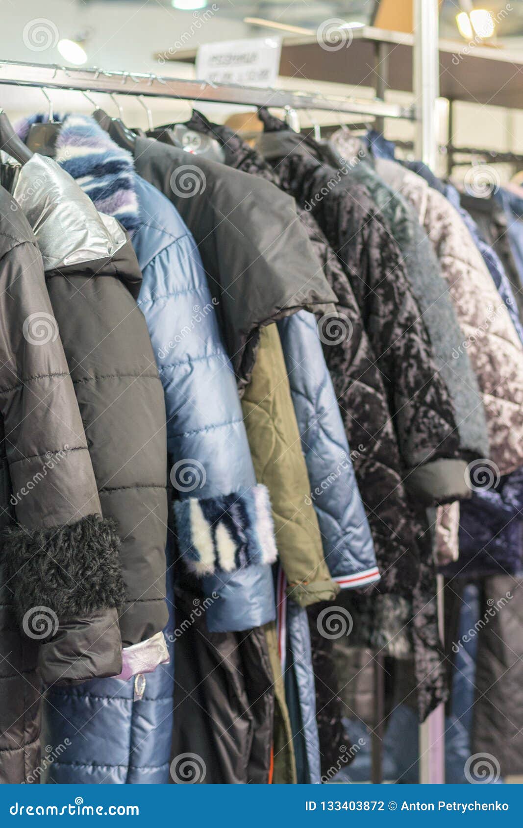 Winter Jacket in Winter Sale on a Clothes Rack. Women S Coats on ...