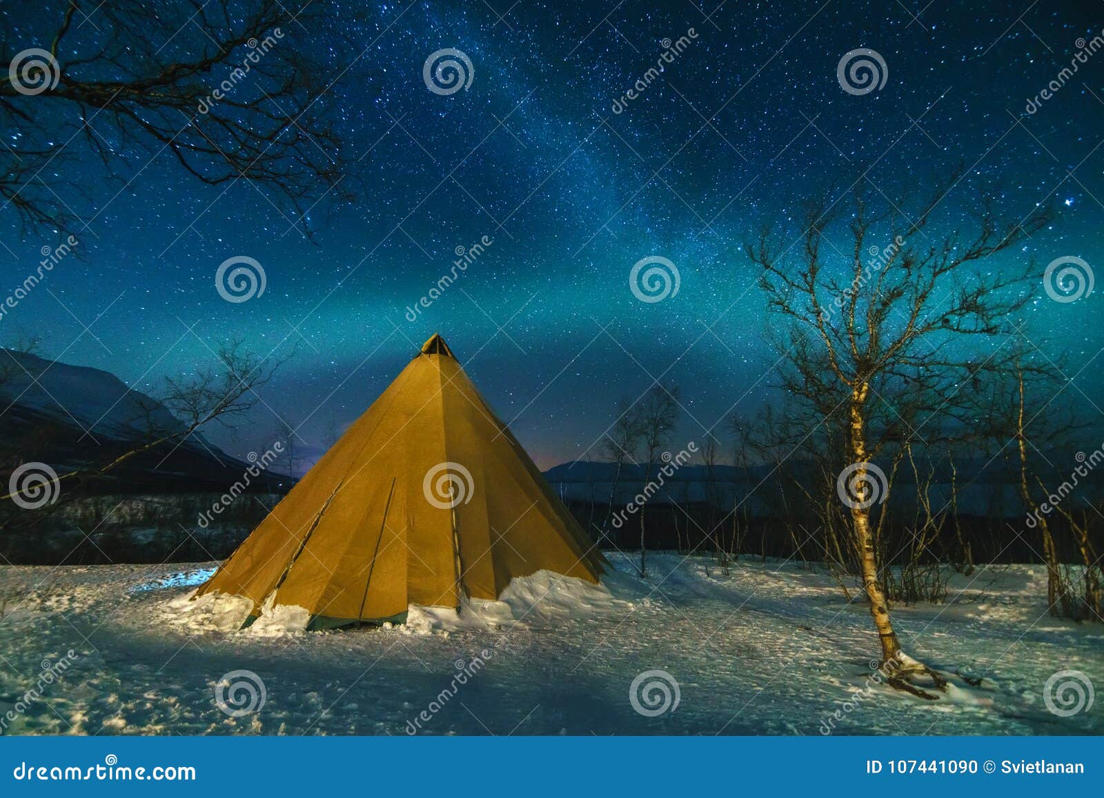 Winter Landscape with Eskimo Tent and Northern Lights. Stock Photo