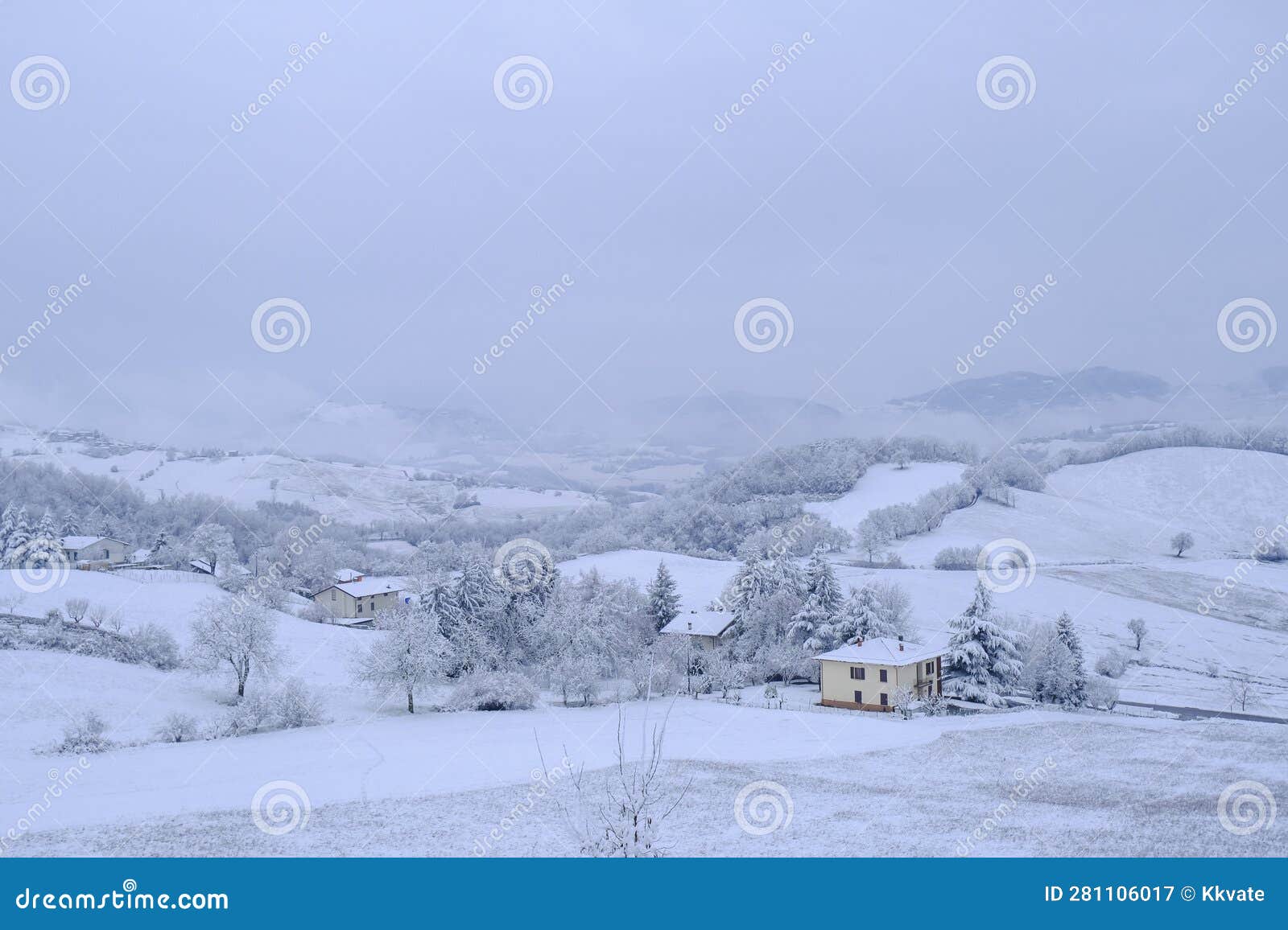 winter landscape. snowy hills, homes, nature, horizon. natural background. appennino tosco-emiliano national park