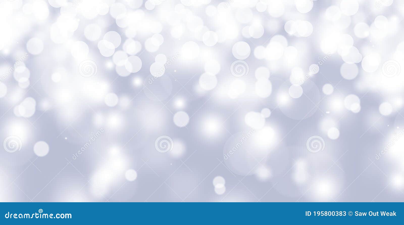 winter light and white abstract bokeh on a bluish background