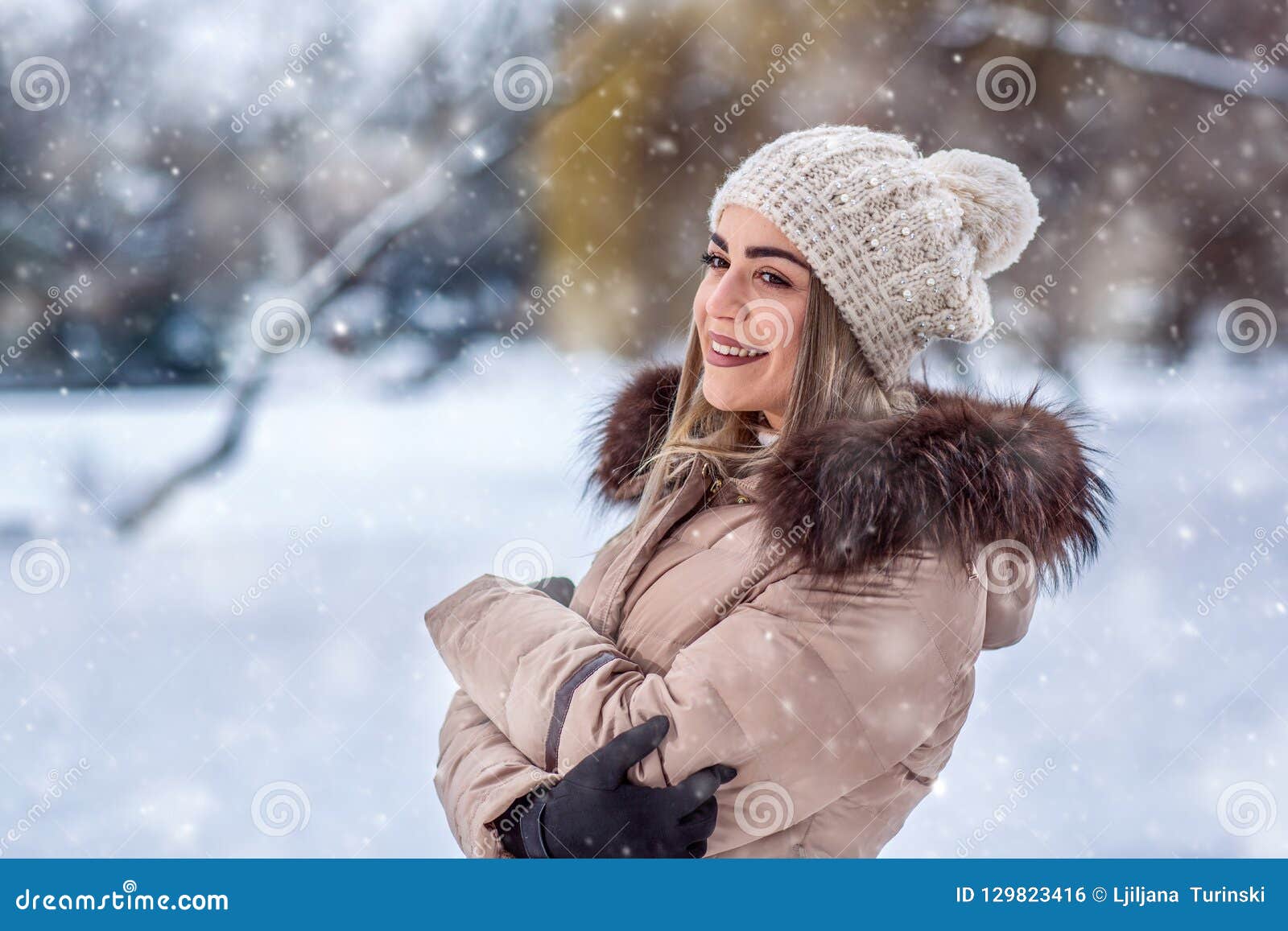 Winter Portrait of Smiling Woman with Snowflakes in Forest Stock Photo ...